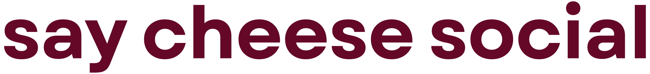 Text saying "say cheese social" in magenta color on a black background.
