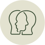 Line drawing of two overlapping human heads in profile, facing opposite directions, on a light green circular background.