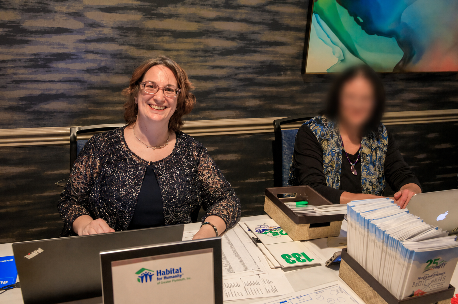 Volunteering at the Hearts & Hammers Gala in support of Habitat for Humanity and its mission to build stronger communities.