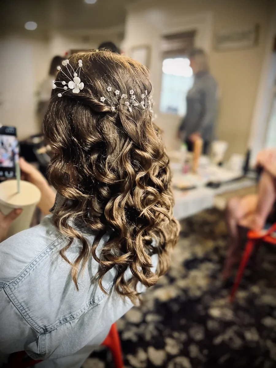 Formal curled updo with dimensional brunette hair by The Hair Court in Bryan-College Station, TX.