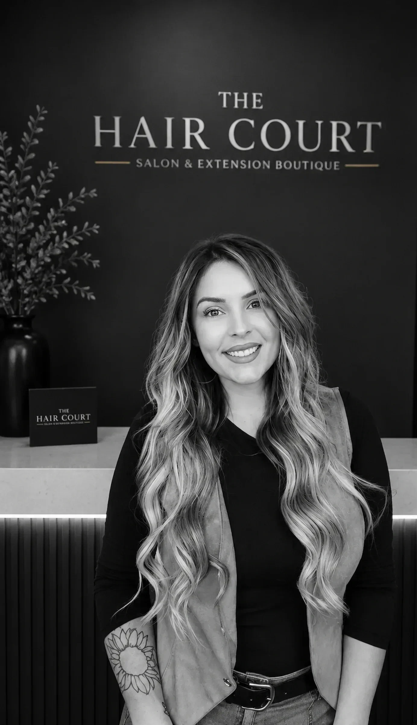 Courtney, owner and senior extension specialist at The Hair Court in Bryan, Texas