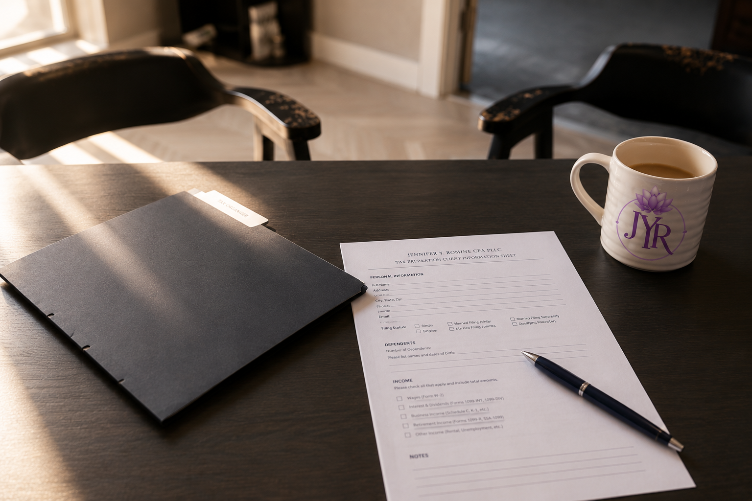 An office or home workspace with a dark wooden table, a black chair, a white mug with a purple logo, and a tax preparation client information sheet with a pen, illuminated by sunlight.
