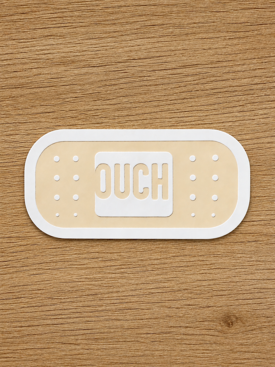 Ouch sticker.