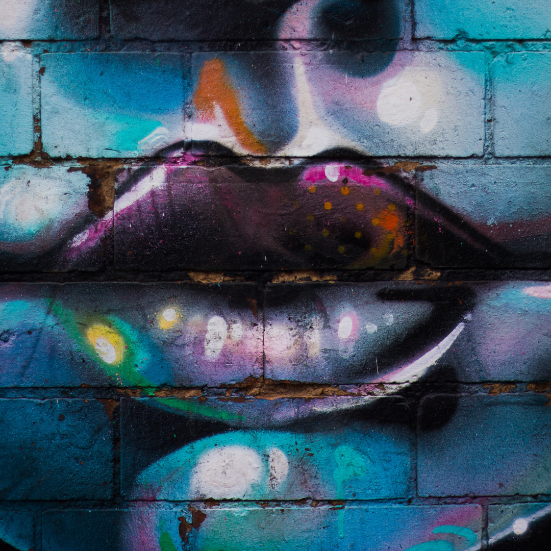 grafitti lips on a shabby cinder block wall