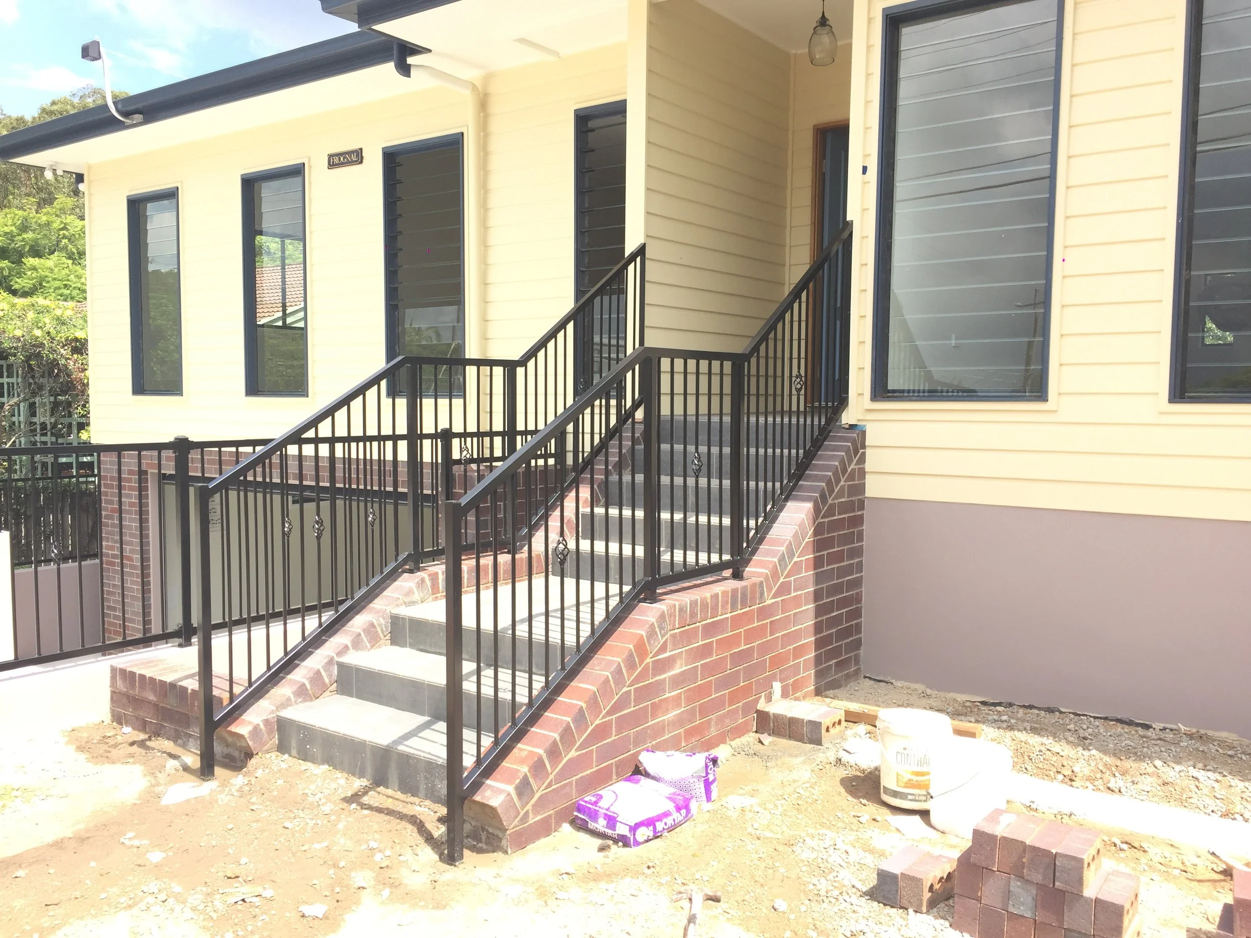 Black aluminium balustrades built and installed by Swift powdercoating and Fencing Brisbane