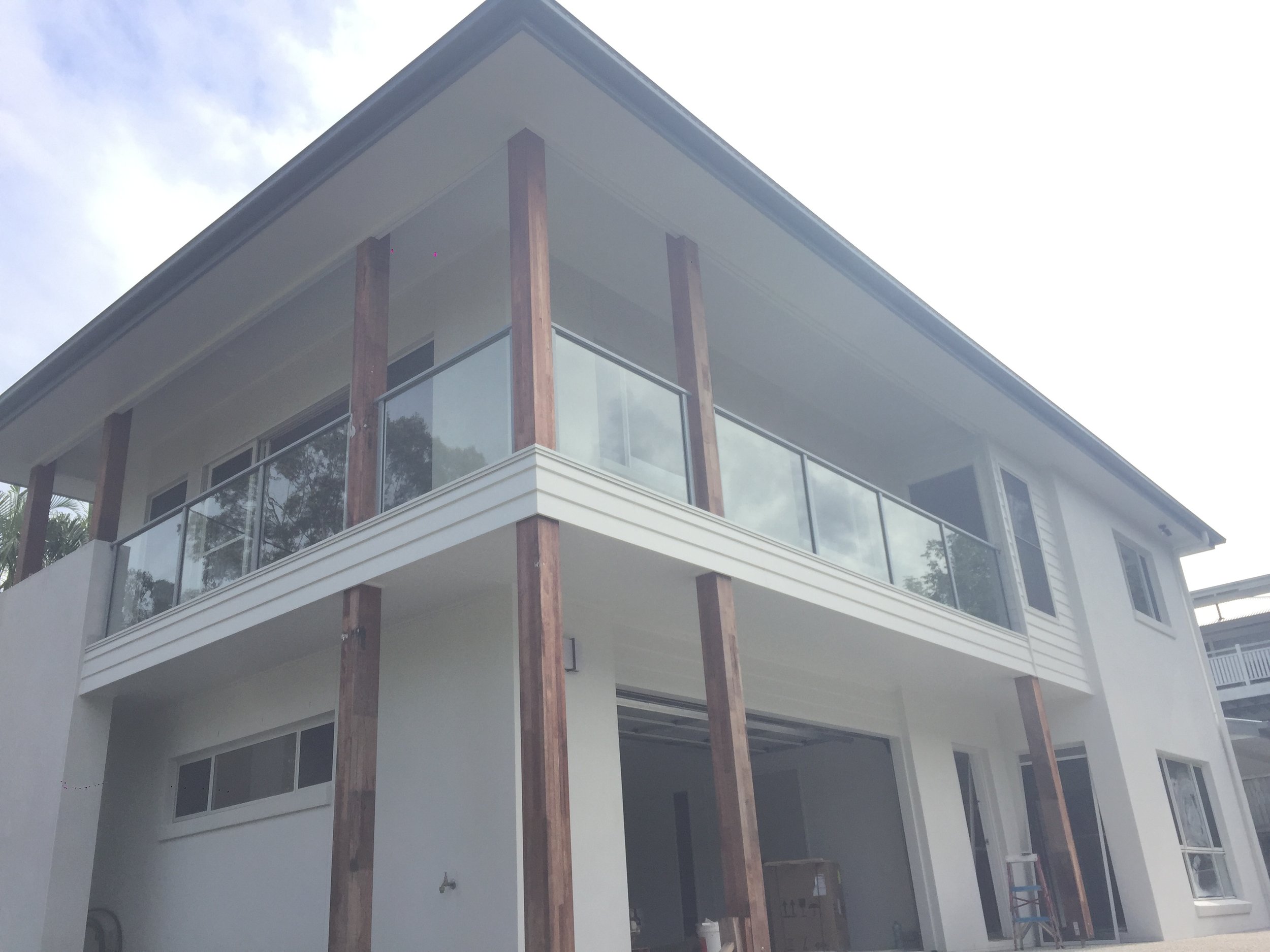 Glass balustrade manufactured and installed by Swift Powdercoating and Fencing Brisbane