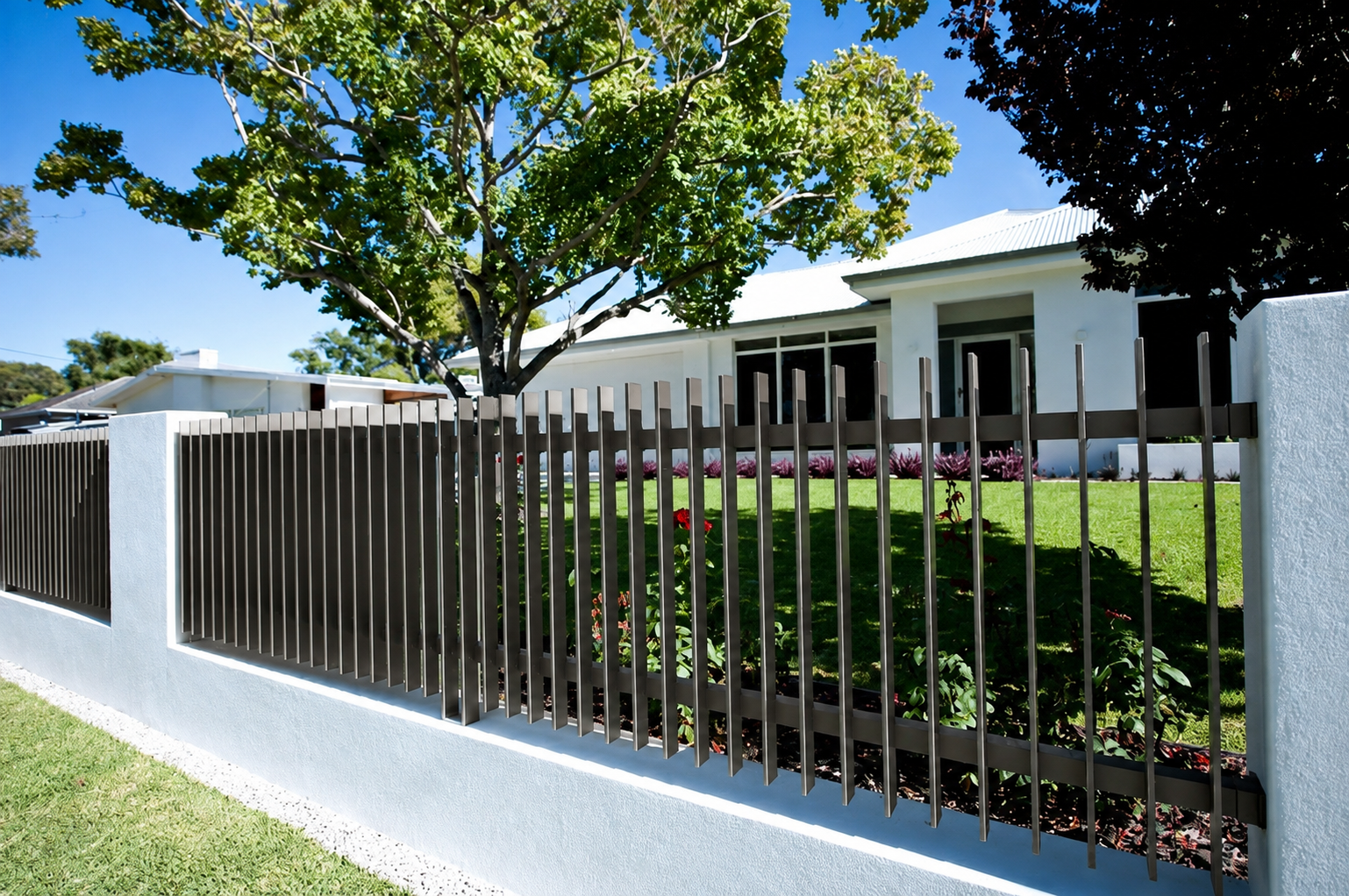 black narrow batten front fence manufactured by Swift Powdercoating and Fencing Brisbane