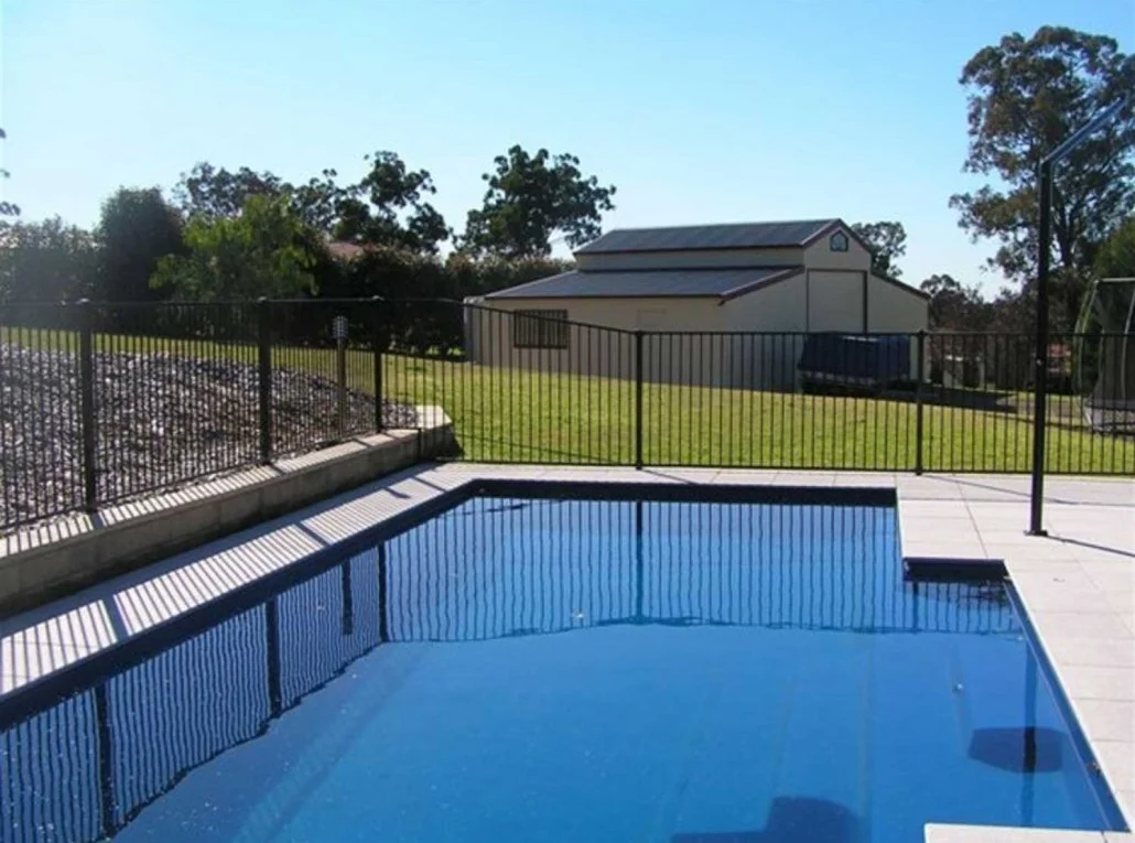 An outdoor fencing at swimming pool by swift Powdercoating