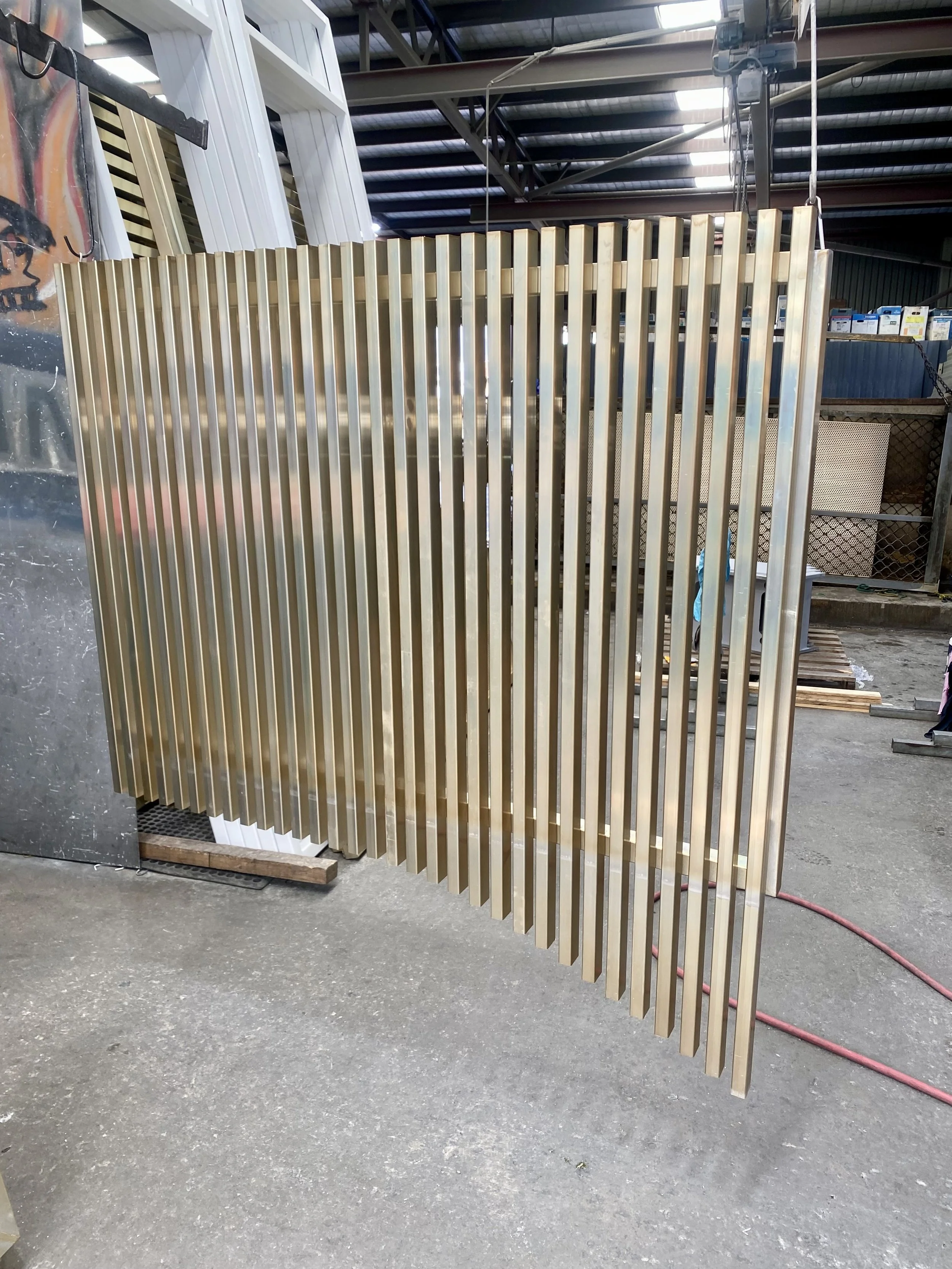 batten front fence panel built by Swift powdercoating and Fencing Brisbane