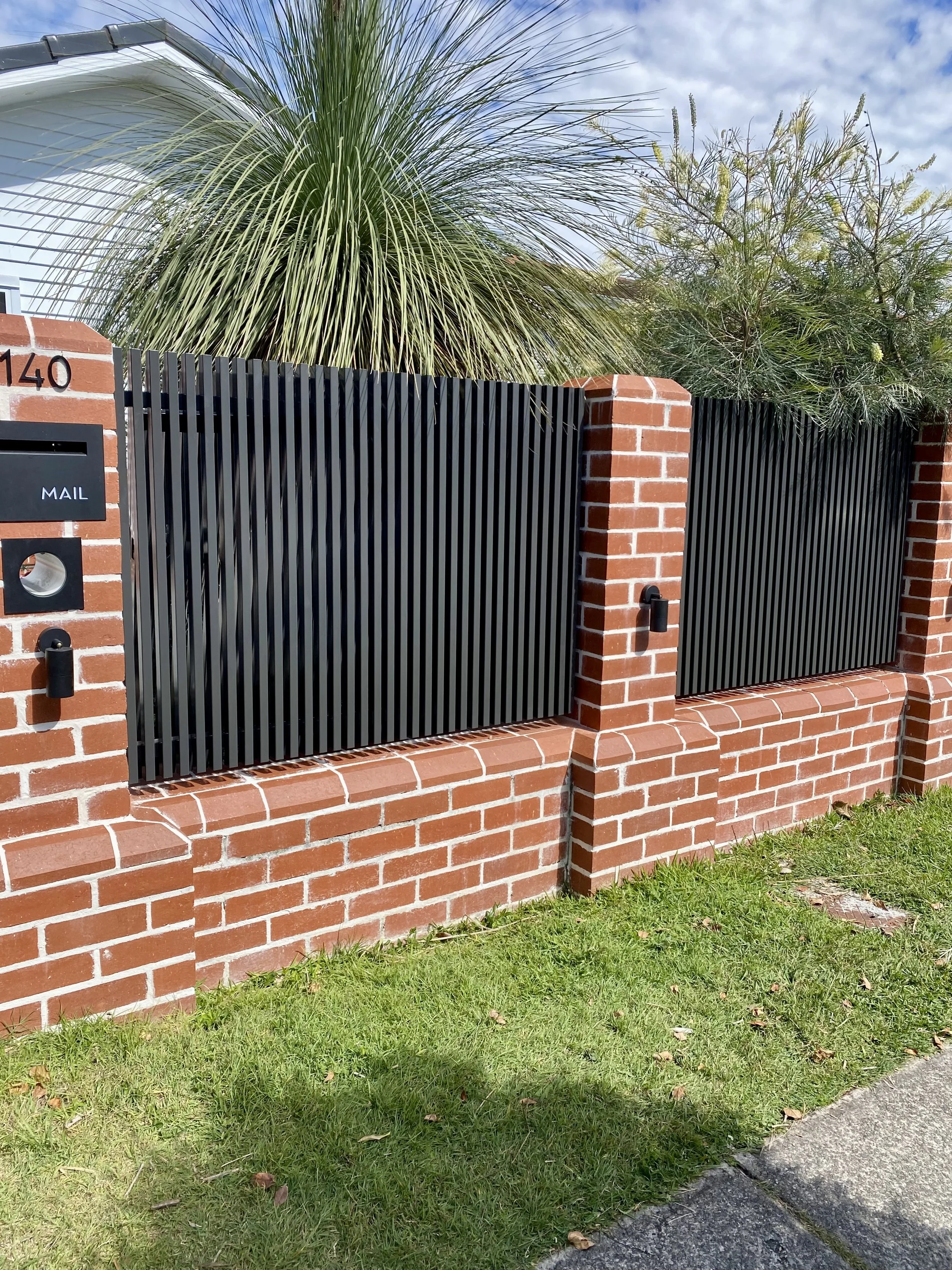 Front fence panels manufactured and installed by Swift Powdercoating and Fencing Brisbane