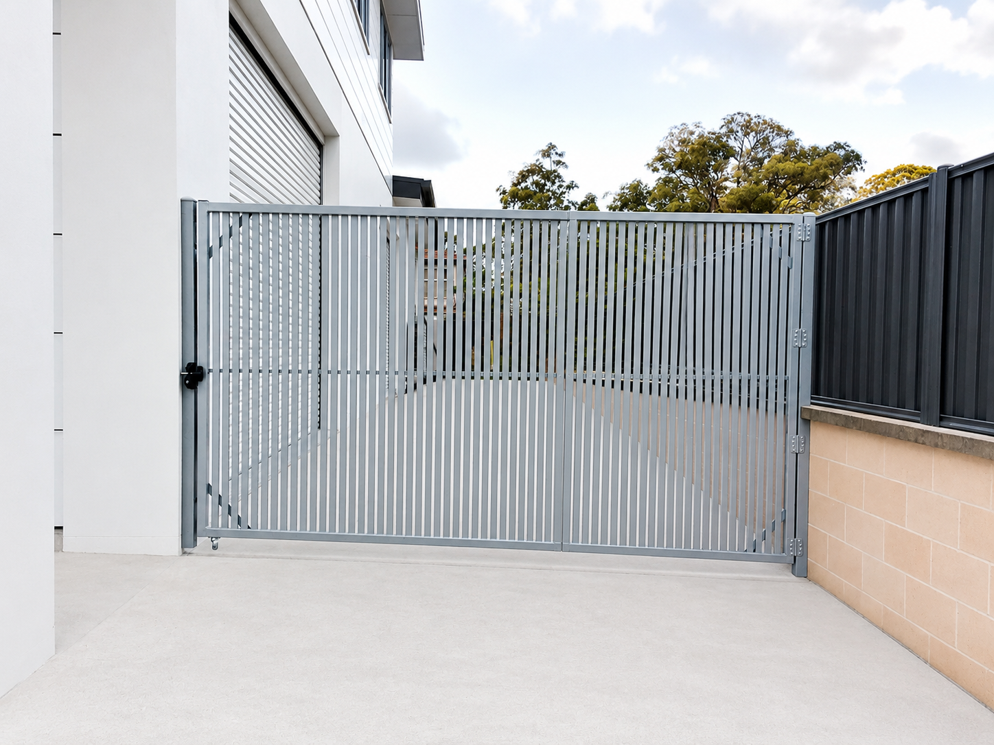 Aluminium powdercoated slat driveway gate.
