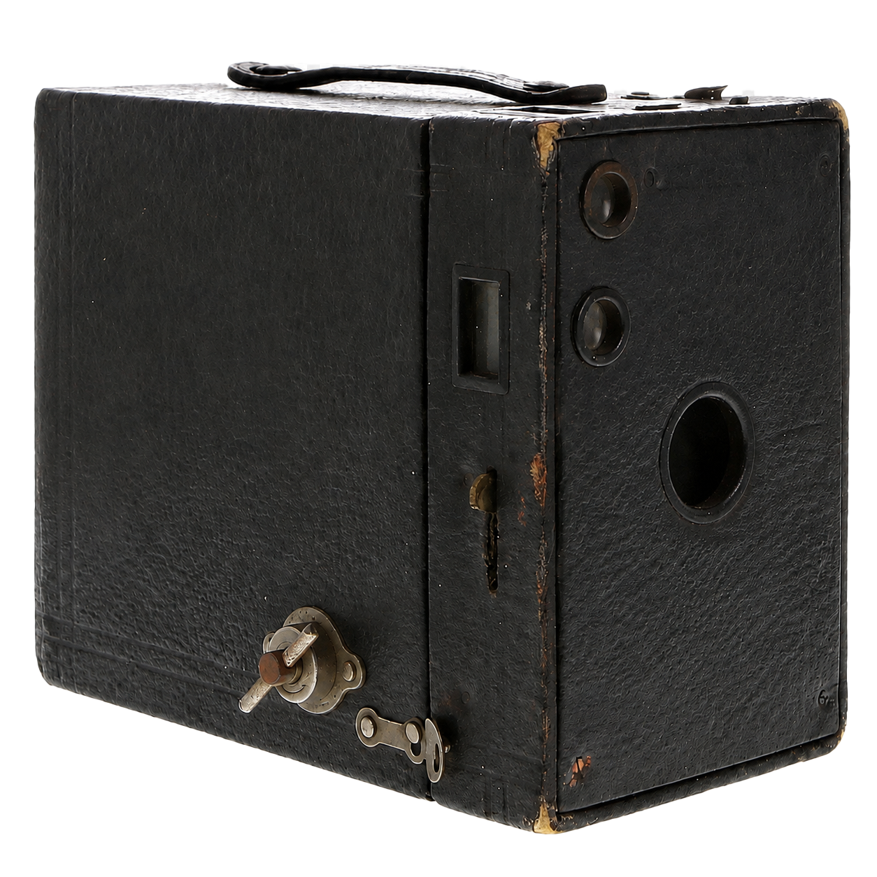 Vintage large black camera with two circular lenses, a small window, and metal knobs and locks, showing signs of wear.