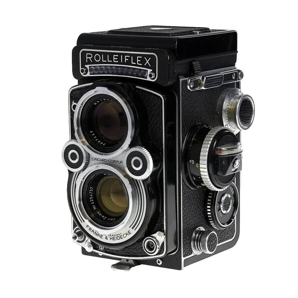 A vintage Rolleiflex twin-lens reflex camera with multiple dials and lenses, against a black background.