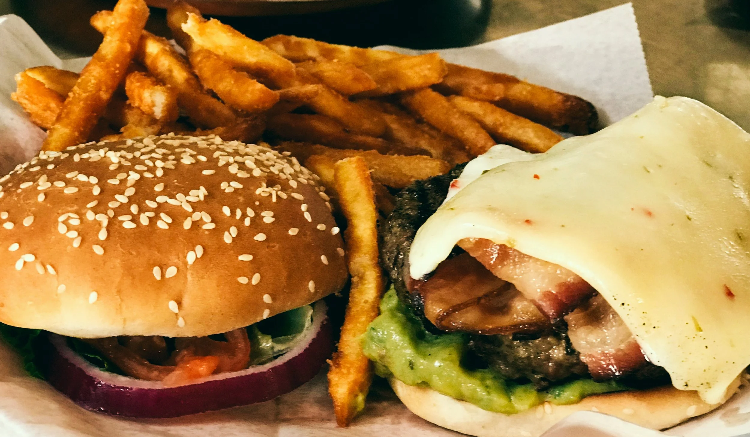 A burger with fries