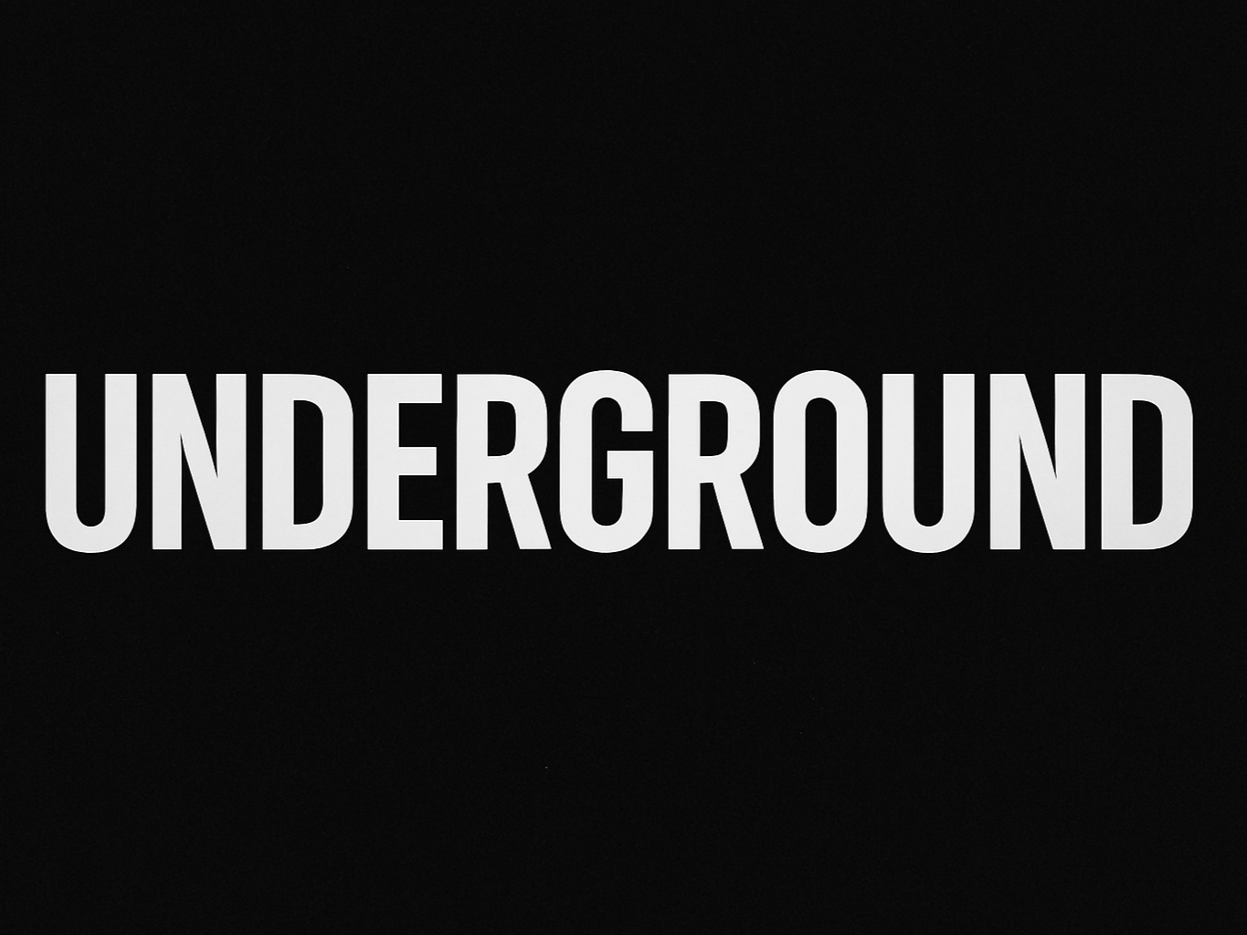 The word 'UNDERGROUND' in large, bold, capital letters on a black background.