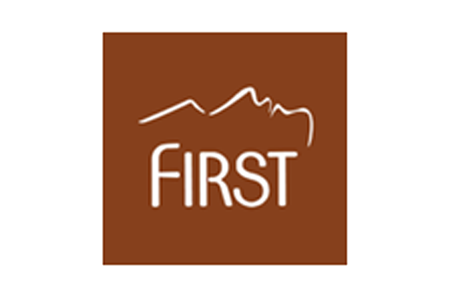 Logo with outline of mountain peaks and the word 'FIRST' in capital letters, brown background with beige section on right.