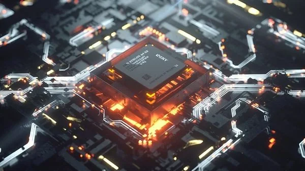 Close-up of a computer chip on a circuit board with illuminated connections
