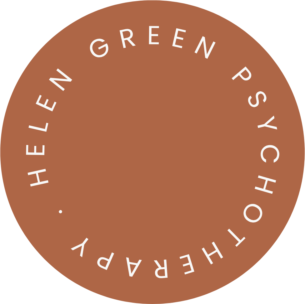 A round logo with a brown background and white text that reads, "The Green Psychotherapy."