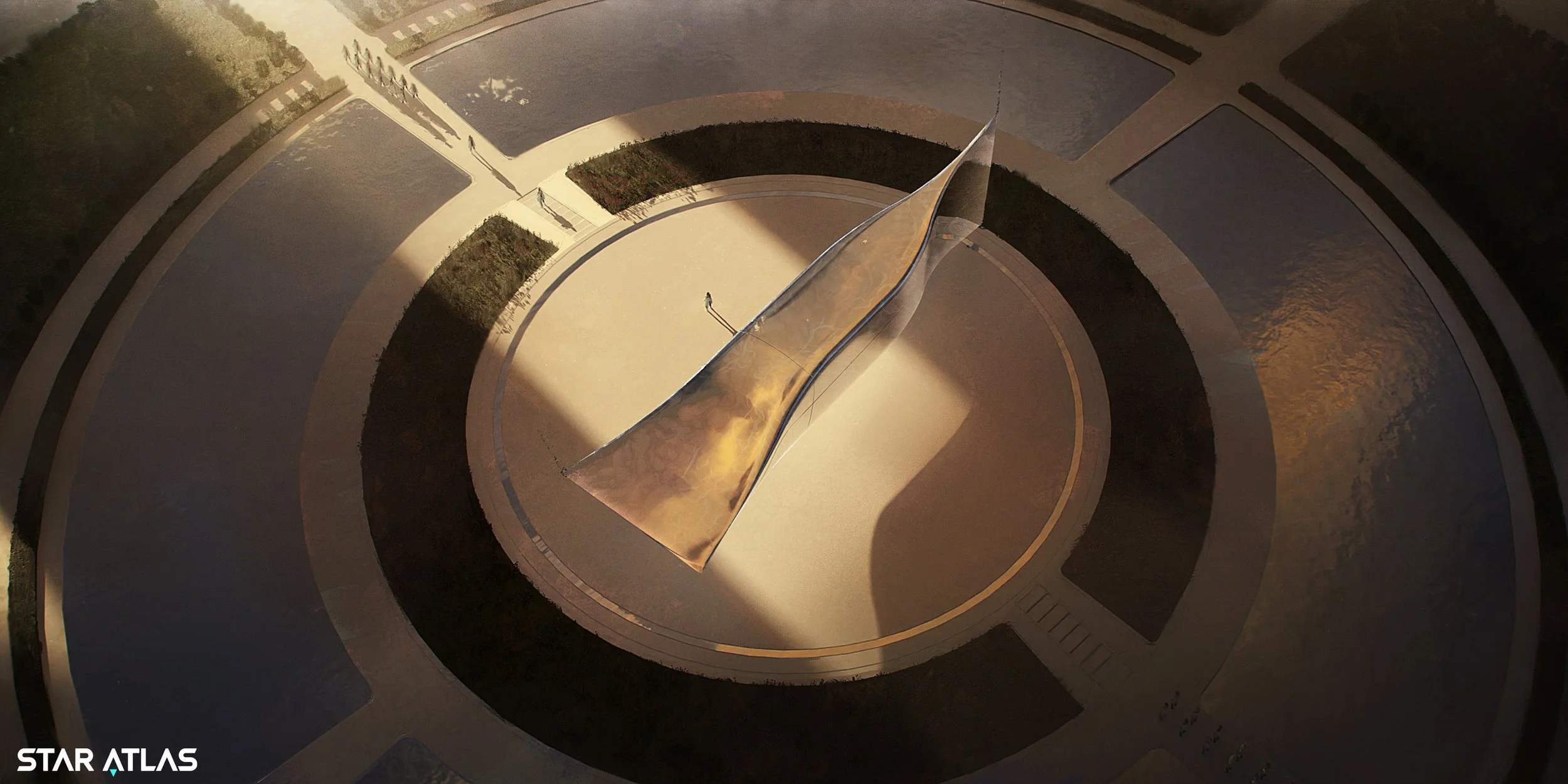 Aerial view of a modern, circular monument with a tall, sculptural metallic sculpture at the center surrounded by a walkway and concentric water features