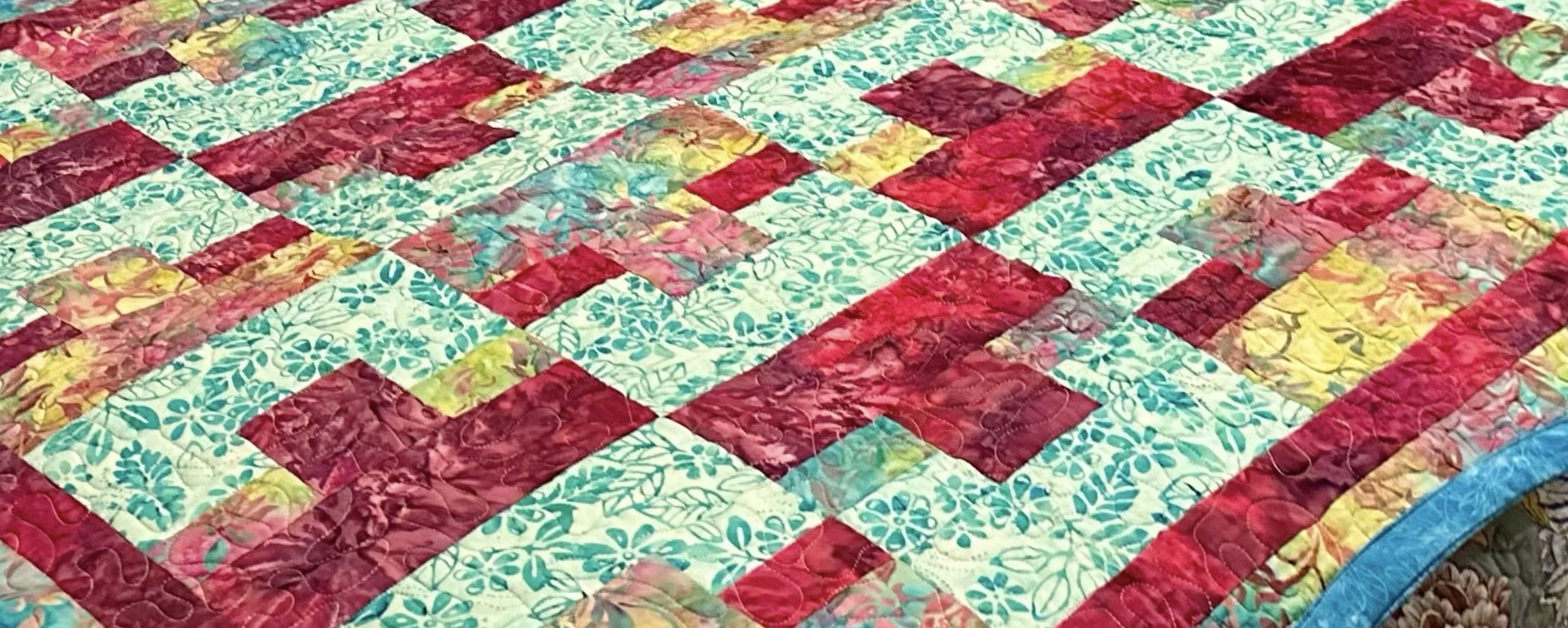 Attraction Lap Quilt · 43" × 60"