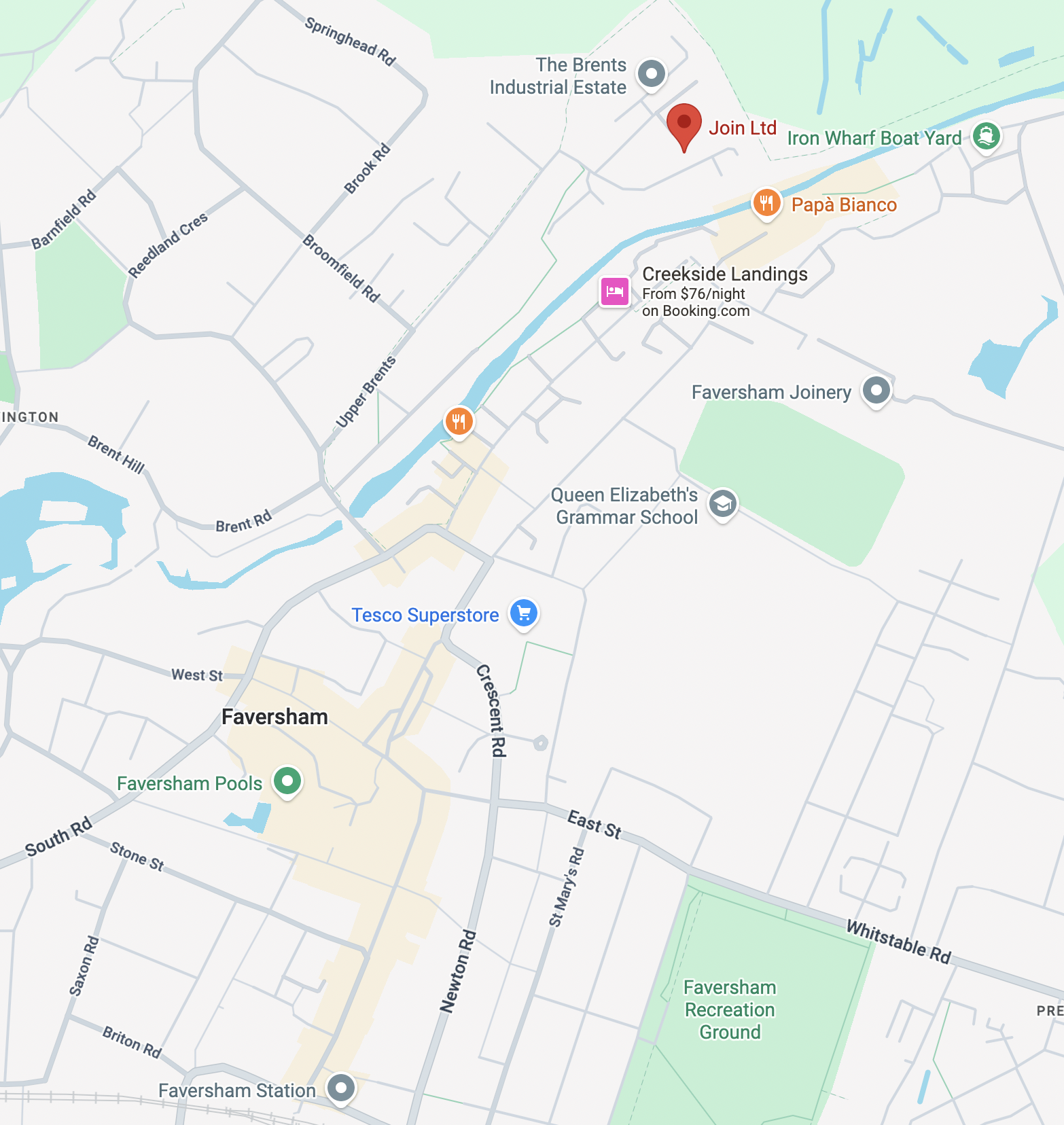 Map of Faversham, showing local streets, landmarks including Faversham Pools, Faversham Recreation Ground, Faversham Station, and businesses like Tesco Superstore, Queen Elizabeth's Grammar School, and various eateries and services.