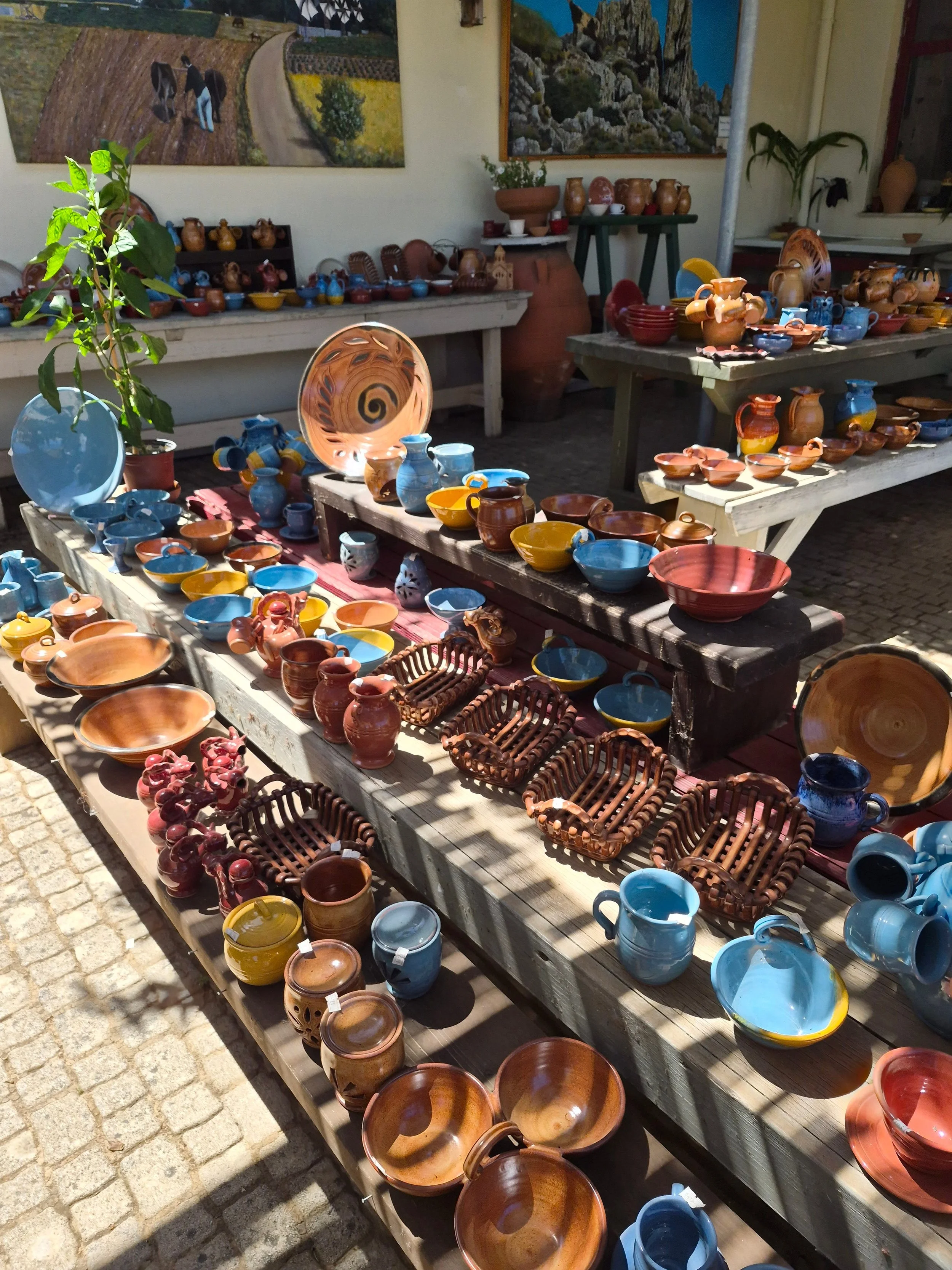Image showcasing a range of coloured Cretan pottery