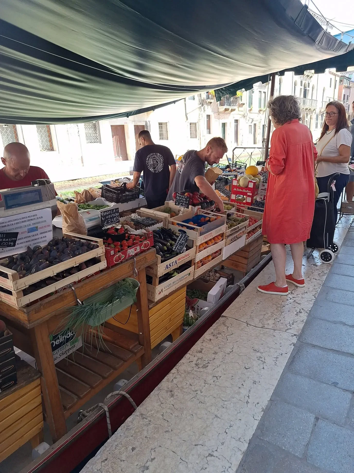 Image of canal side fruit seller in Venice