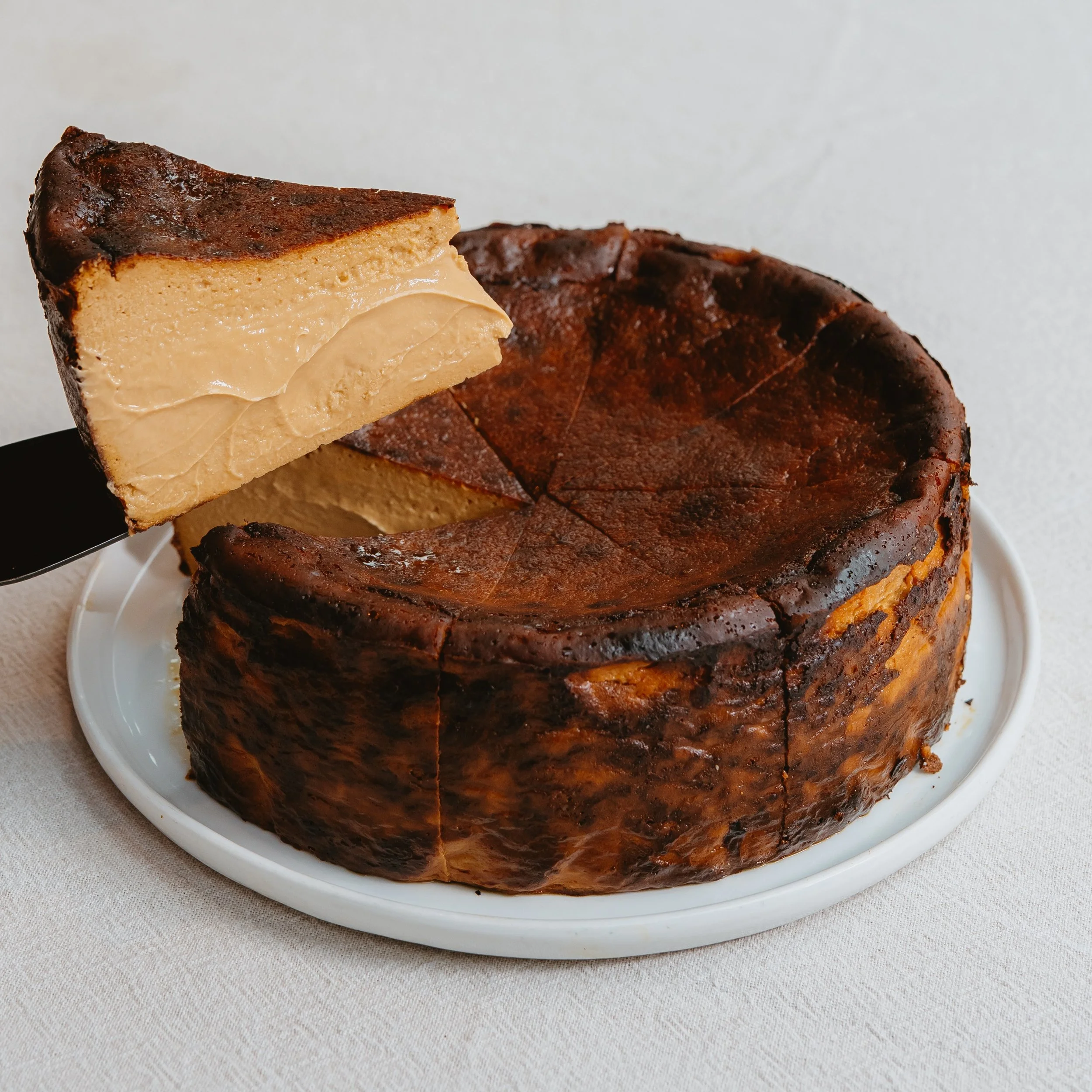 Our dulce de leche basque style cheesecake, available everyday in our shop and on our new website!

burntcakery.com

#dulce #cheesecake #basque #rotterdam 
#dulcedeleche