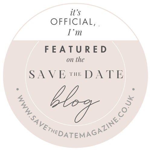 Circular graphic announcing an official blog feature on a save-the-date magazine website.
