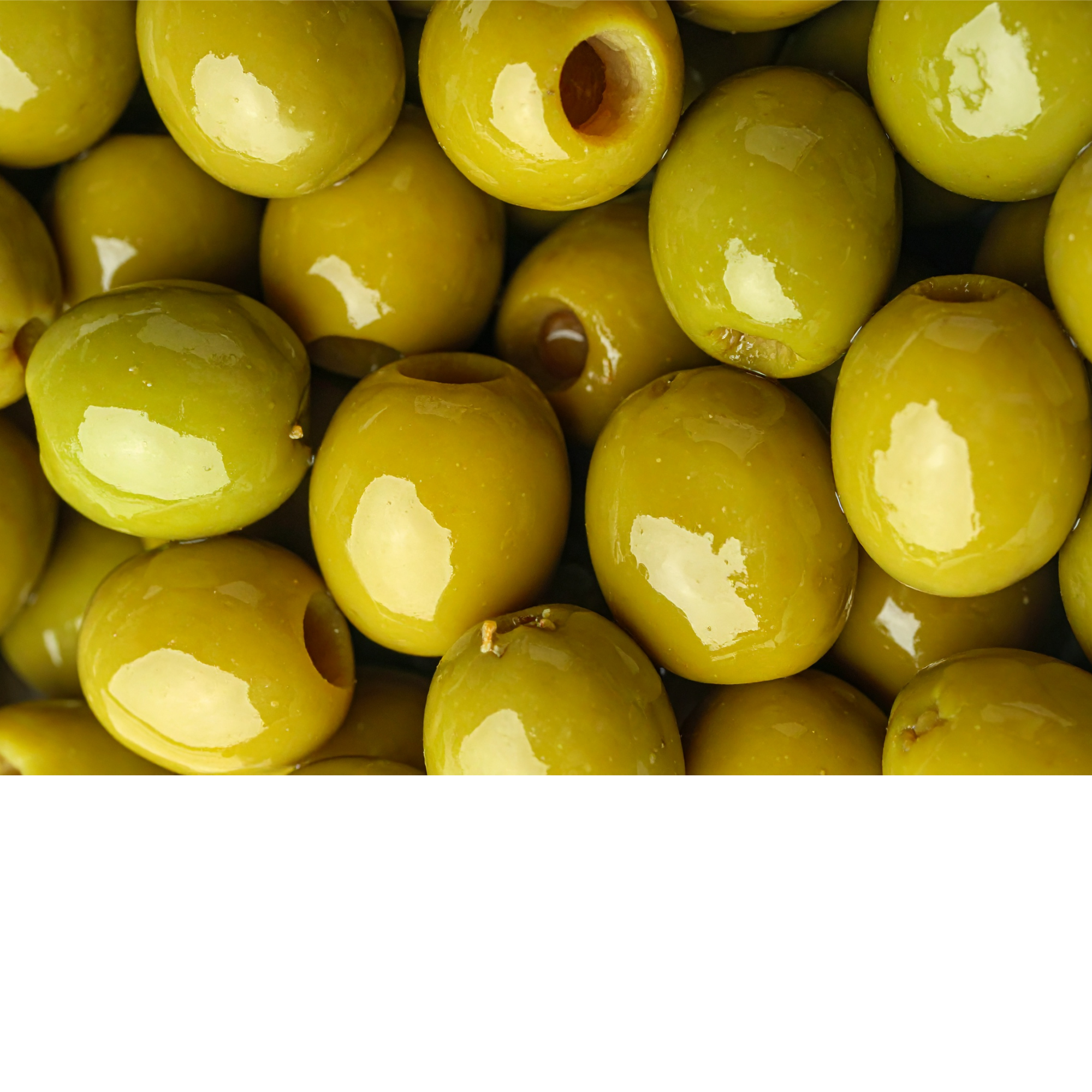 Close-up of green olives with shiny, smooth surfaces, some with visible pimentos inside.