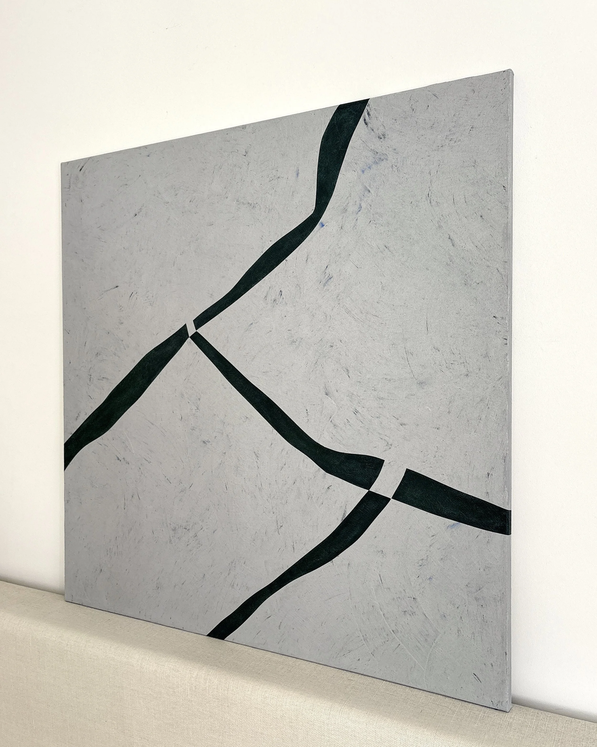 Perspective view of Muga, an original abstract painting by Guillermo Capella, with deep green-black forms crossing a softly textured grey surface.