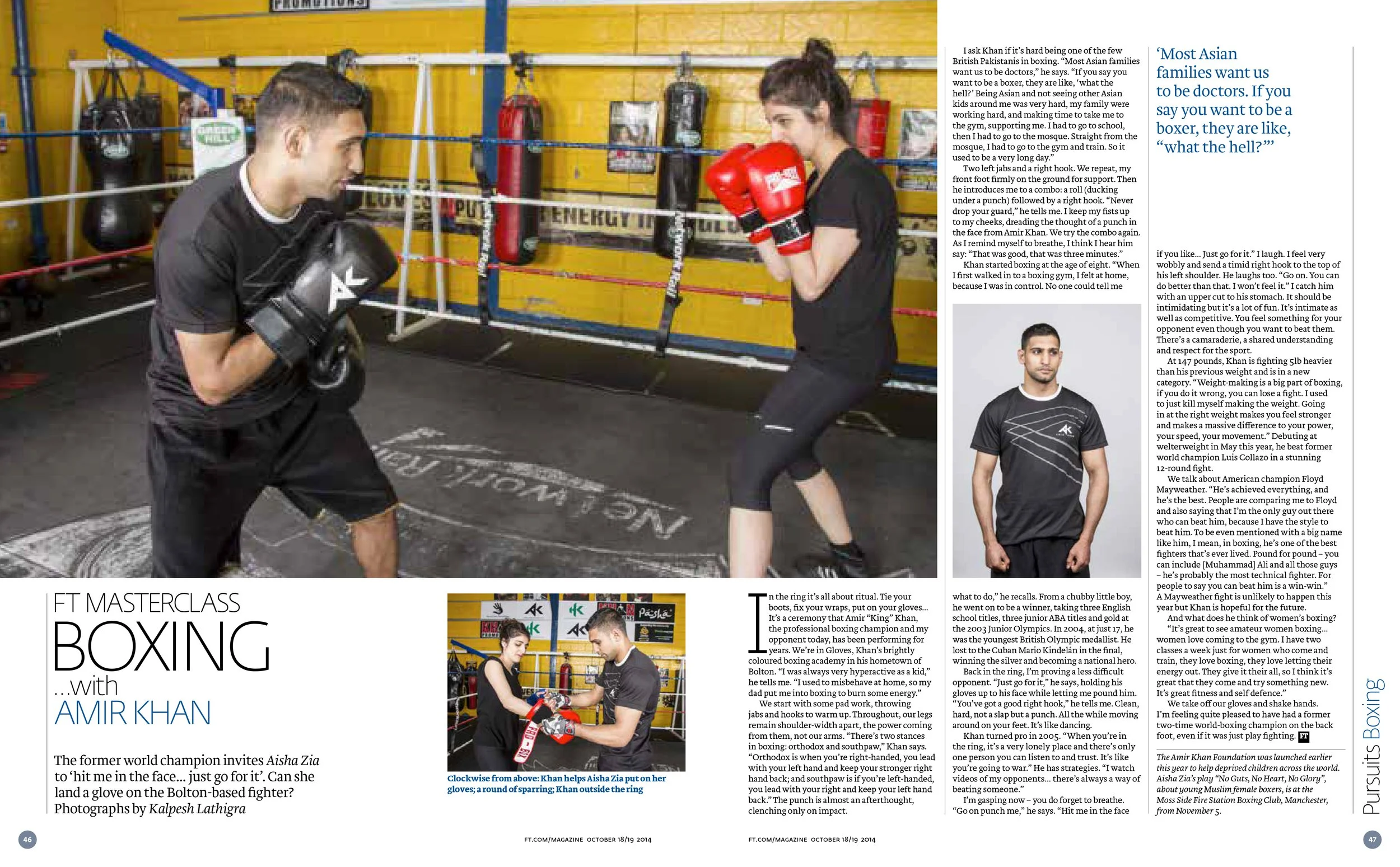 Boxing gym with a man and a woman practicing boxing; the man is wearing black boxing gloves and is in a fighting stance, while the woman has red boxing gloves and is facing him with her fists raised.
