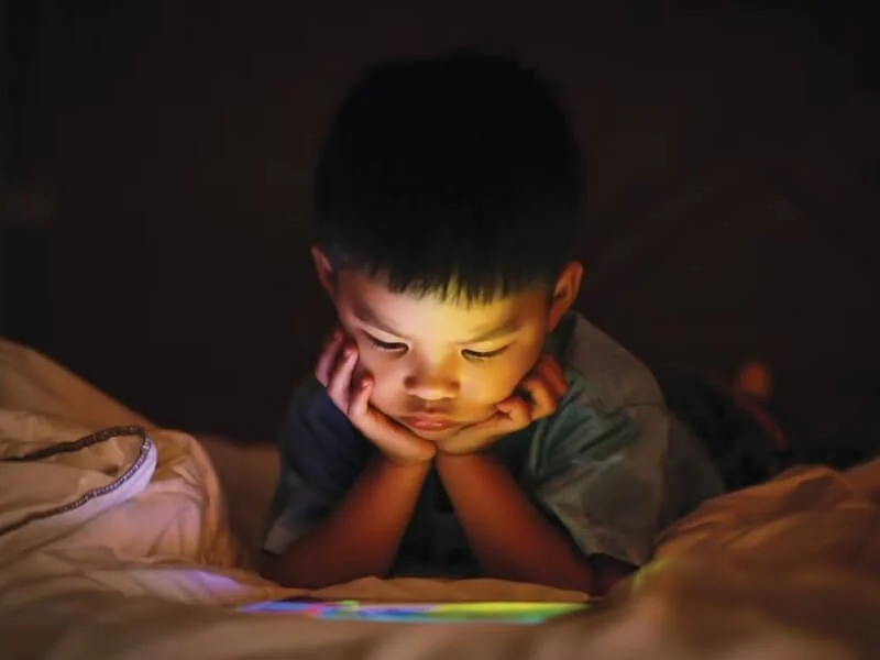 A child looking at a screen