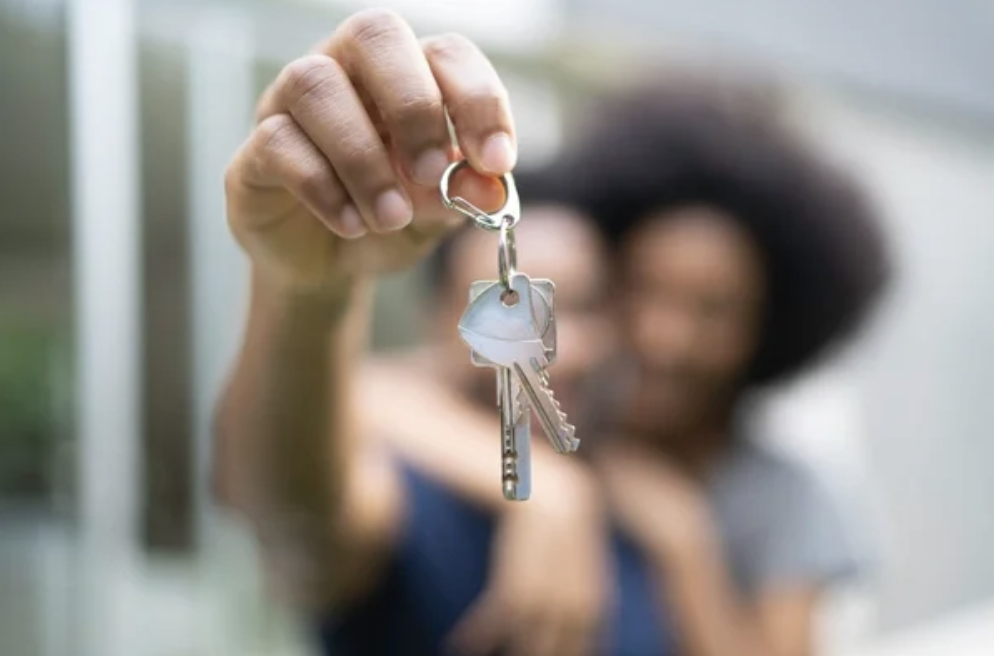 Real Estate - lady with keys