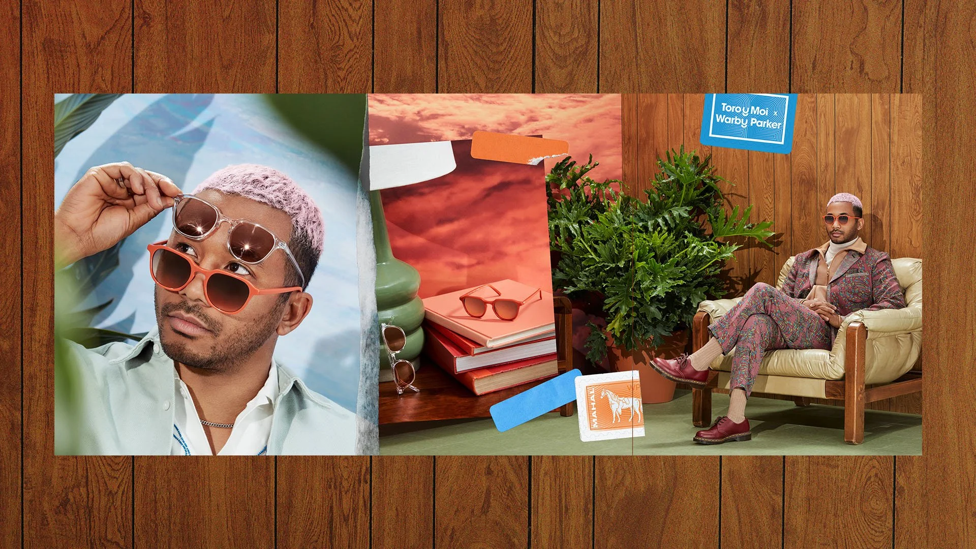 A collage of two images on a wooden floor background. The left side shows a man with pink hair wearing sunglasses, holding another pair of sunglasses near his face. The right side features a man with pink hair, glasses, and patterned suit sitting on a cream-colored sofa next to a large green potted plant, with a backdrop of a wooden wall and a blue sign that reads 'Toro y Moi Warby Parker'.