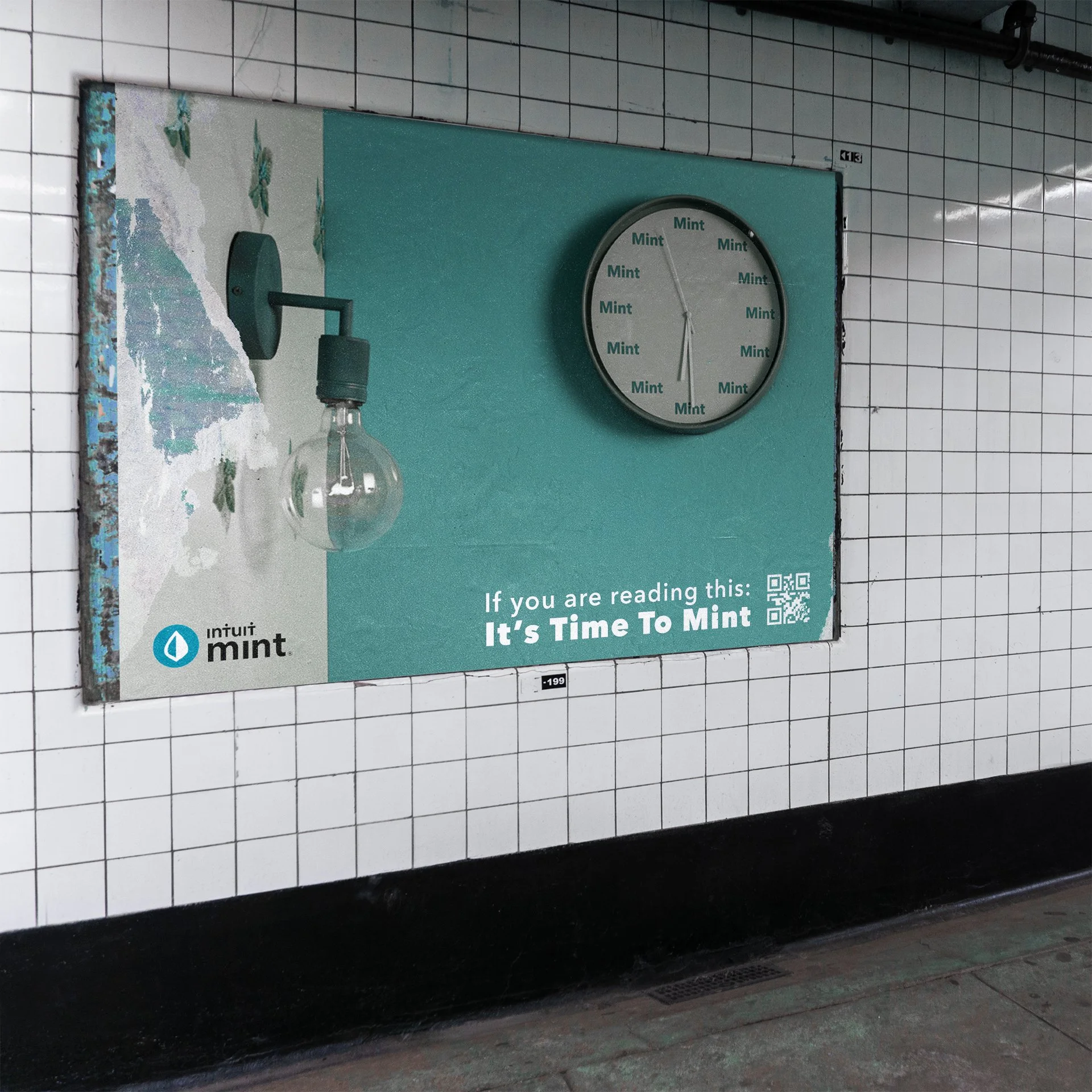 A wall clock with the word 'Mint' repeating as the hour markers, mounted on a teal-green wall. The setting appears to be a public space with tiled walls.