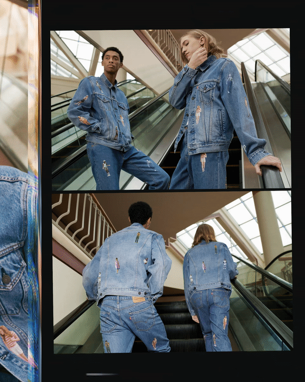 Three young adults wearing distressed denim jackets and jeans riding an escalator in a modern indoor setting, possibly a shopping mall or airport.