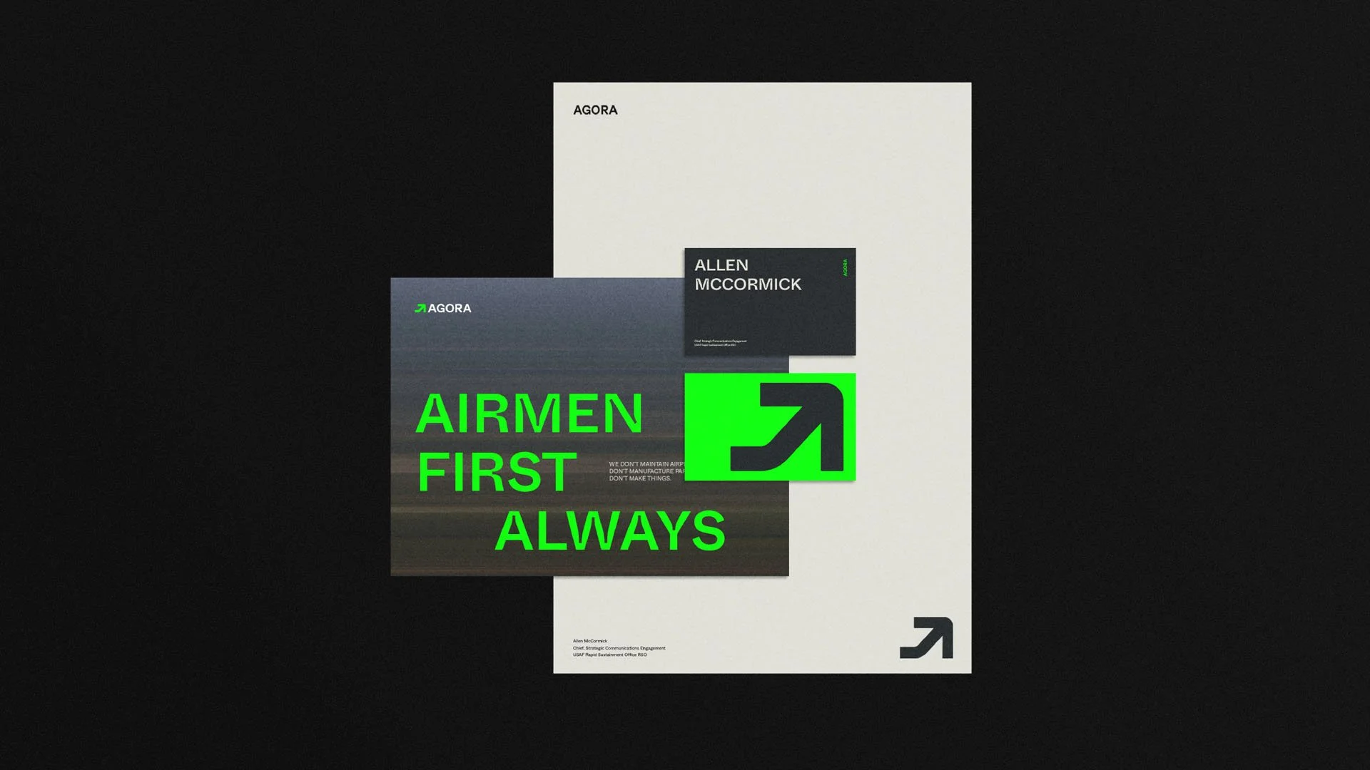 A modern presentation slide for Agora, featuring a dark background with overlapping white, black, grey, and green elements. Prominent green text reads "AIRMEN FIRST ALWAYS" with a green arrow symbol.
