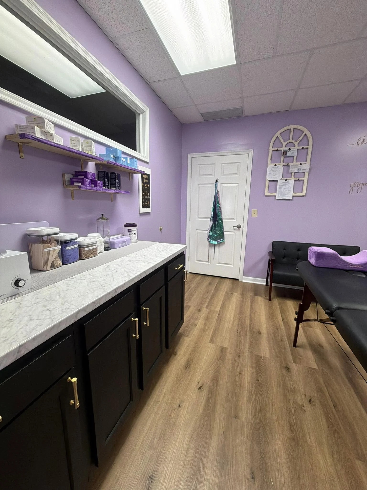 The Purple Wax Suite a view of what your wax specialist will see when you walk through the door, unless she meets you there, which is more likely.