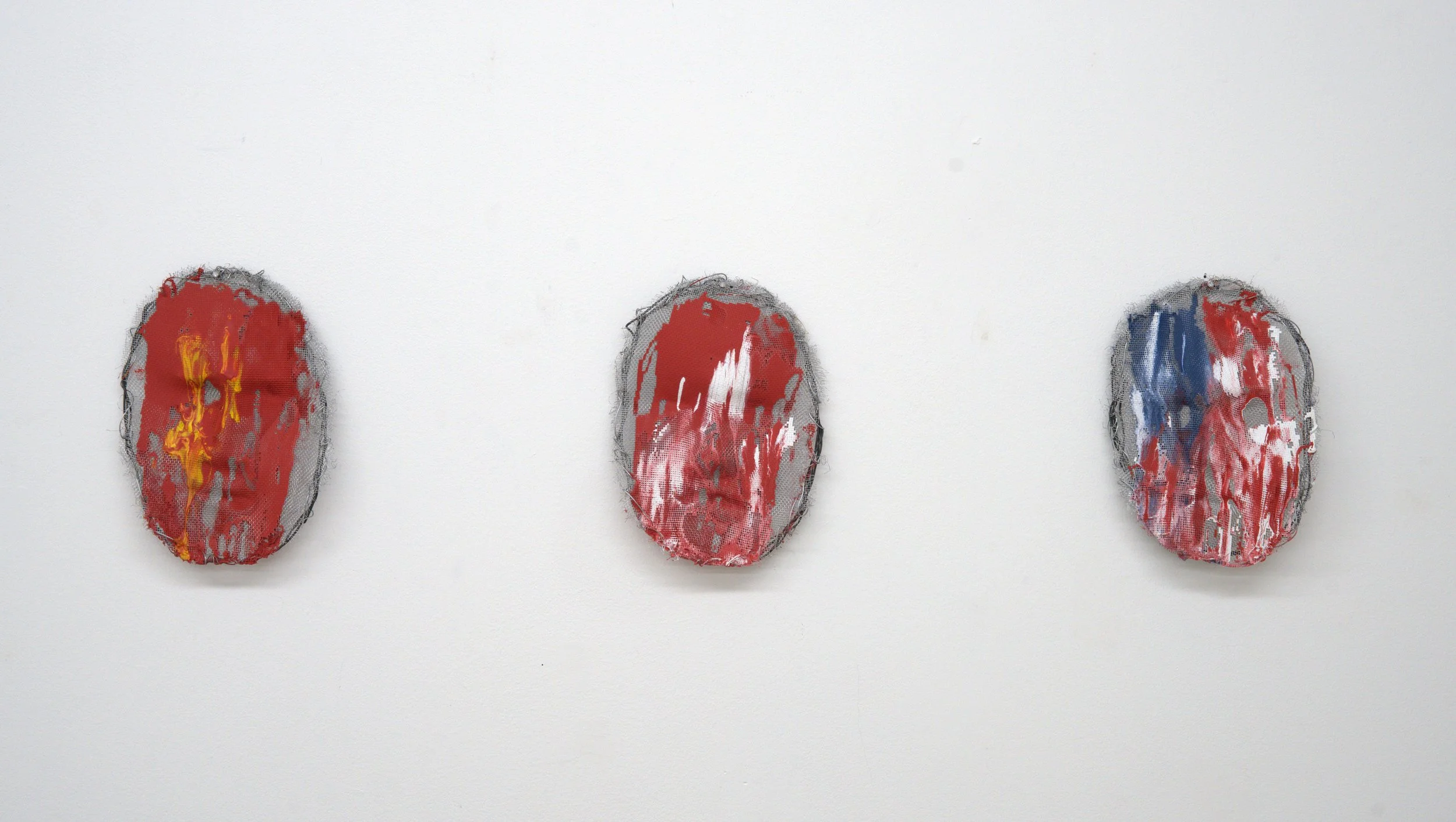 3 Masks, 2025, each 7" x 5", acrylic paint, wires, mesh
