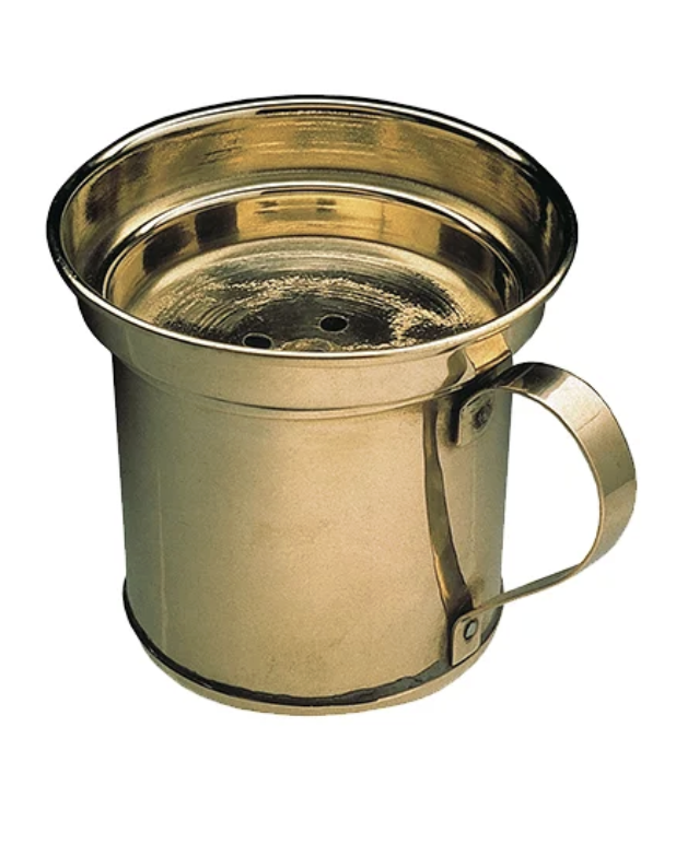 A gold-colored, metallic honey pot with a handle, used for storing honey, on a white background.