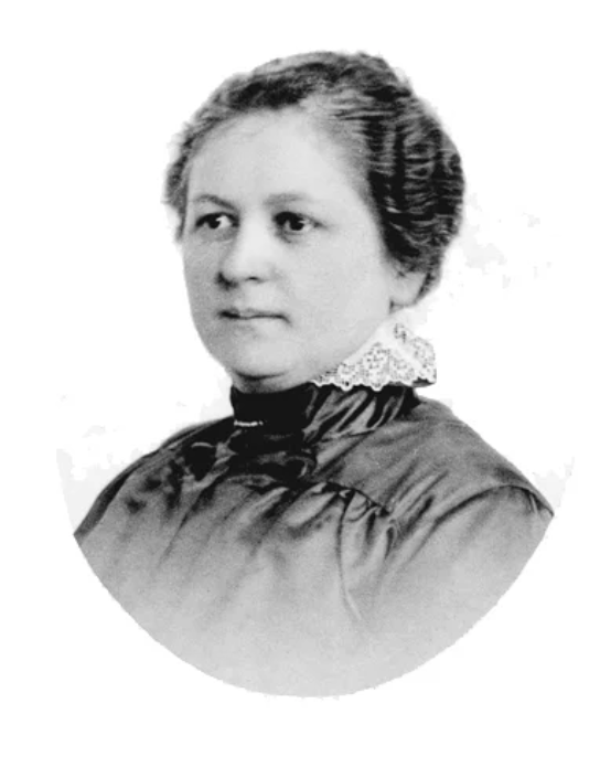 Black and white portrait of a woman with styled hair, wearing a high-neck dress with lace collar.