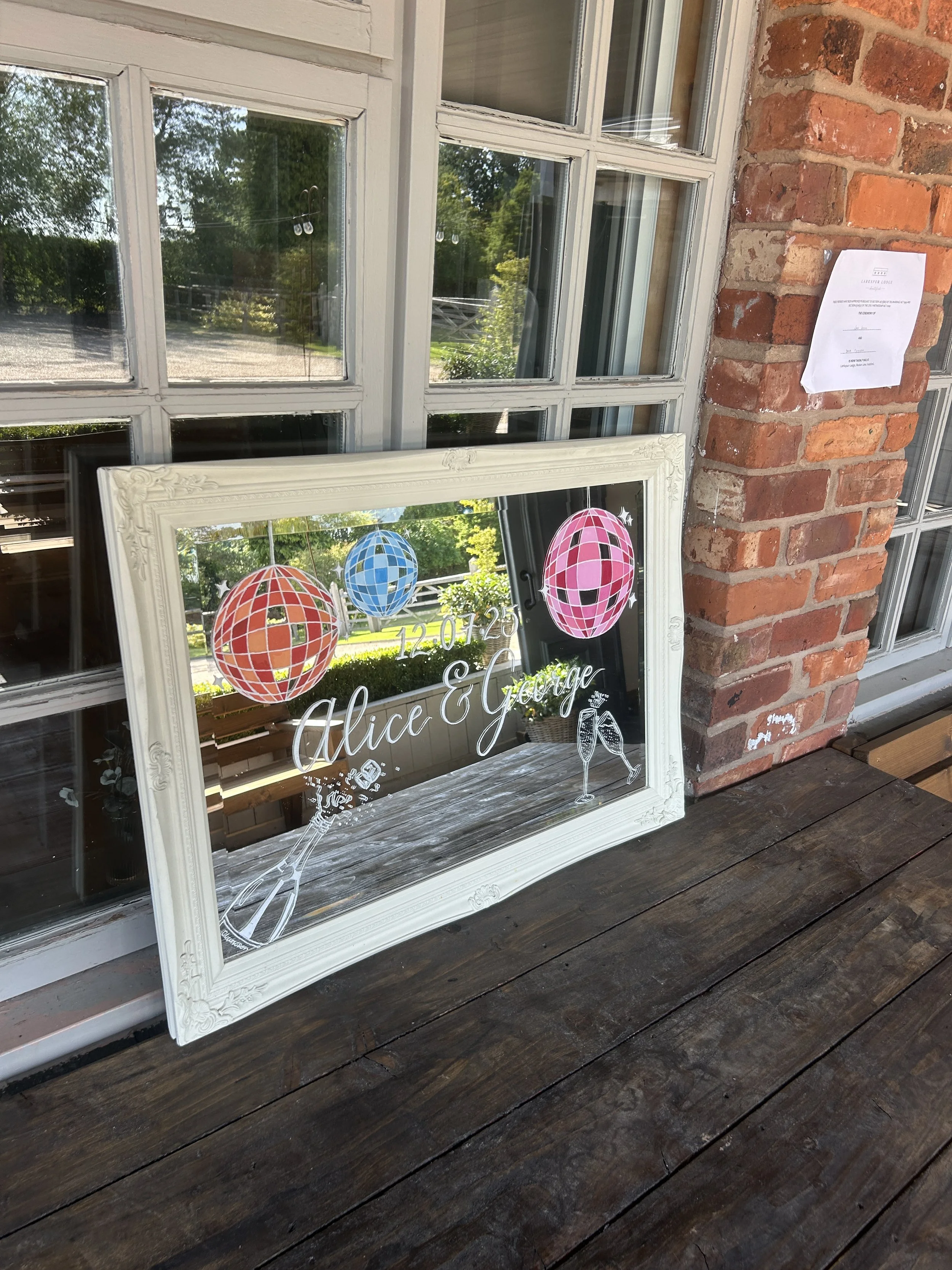 Personalised landscape mirror with disco ball and champagne details