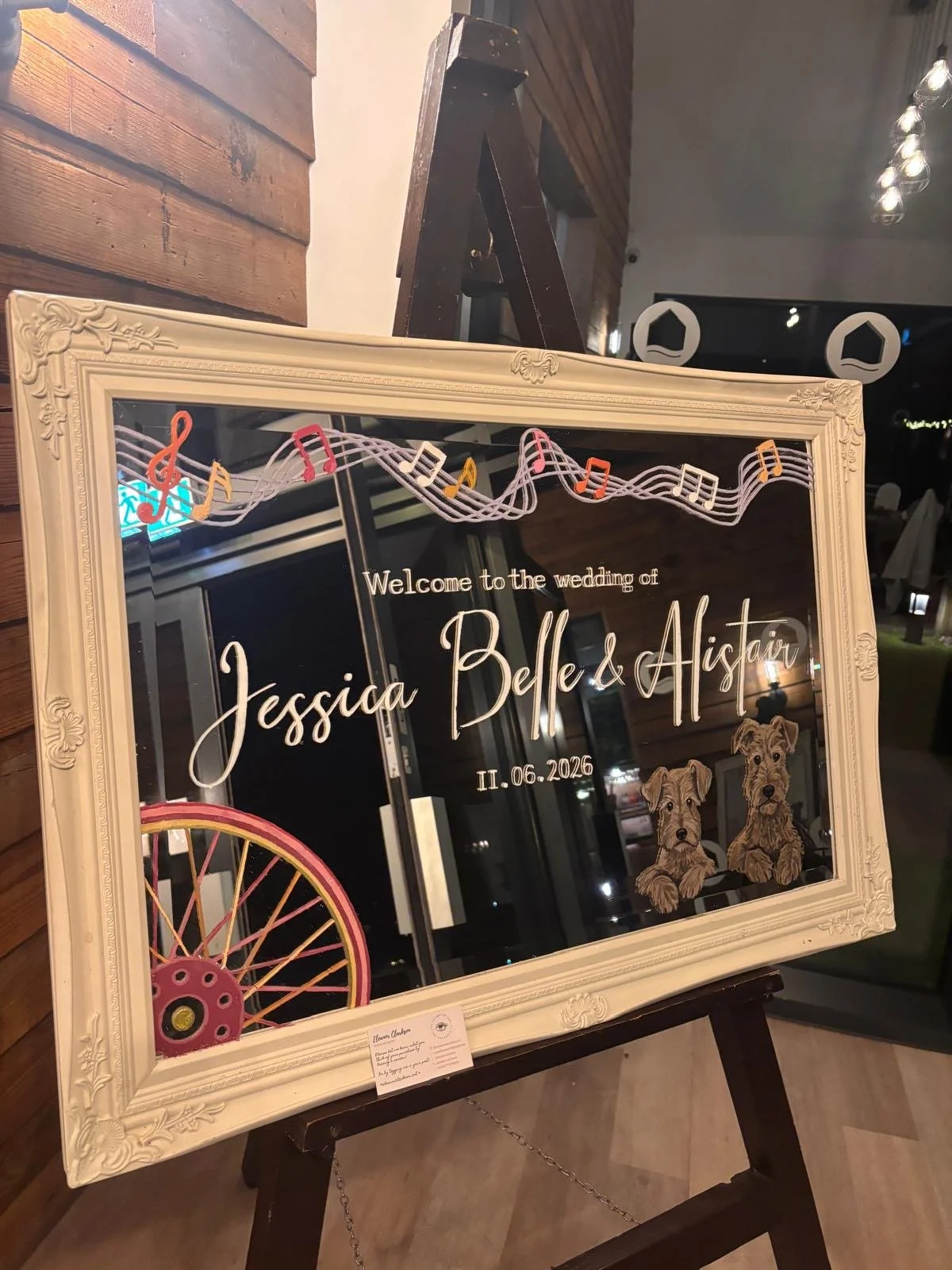 Personalised landscape mirror with dog, bike and music details