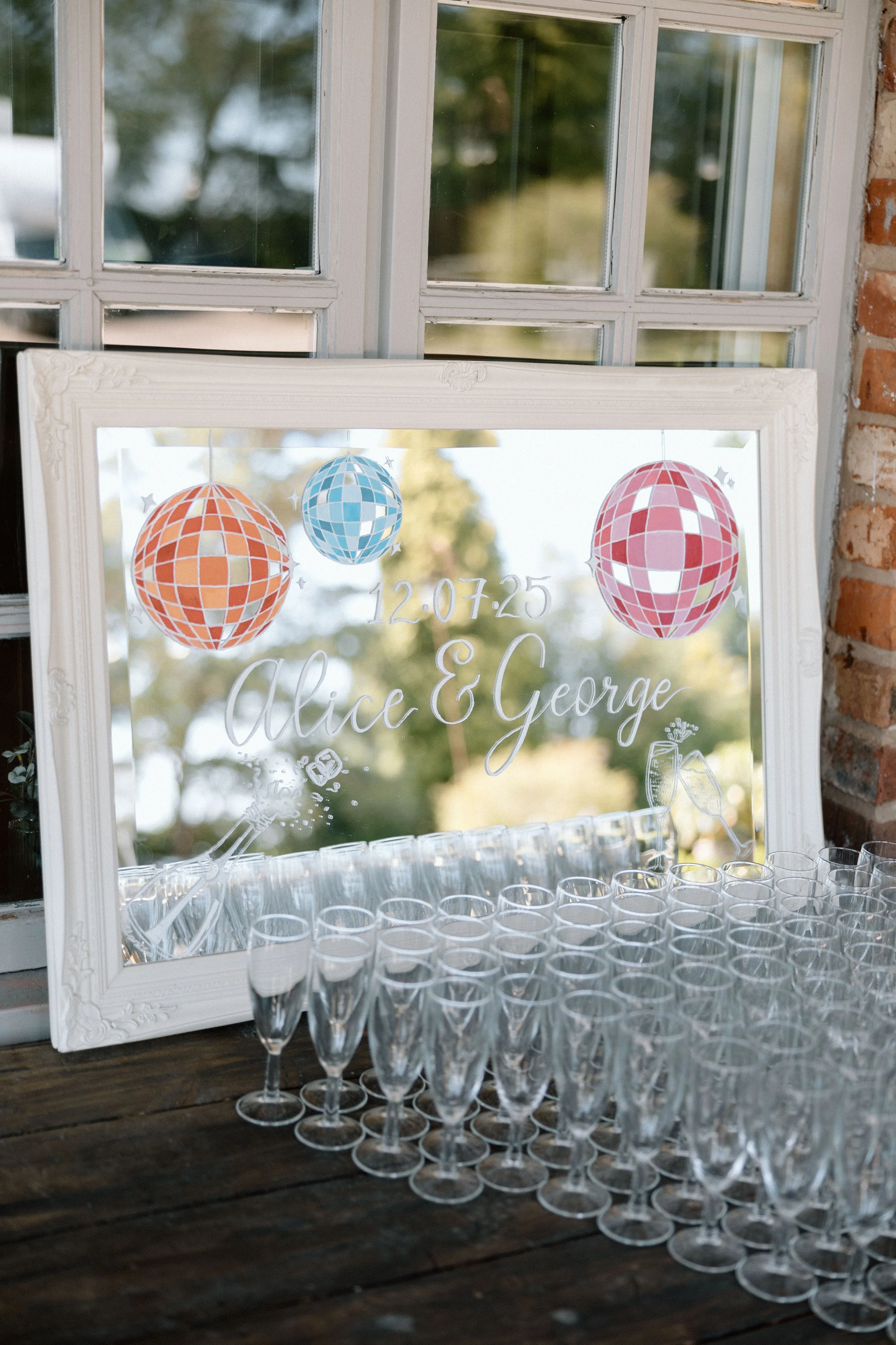 Personalised landscape mirror with disco ball and champagne details
