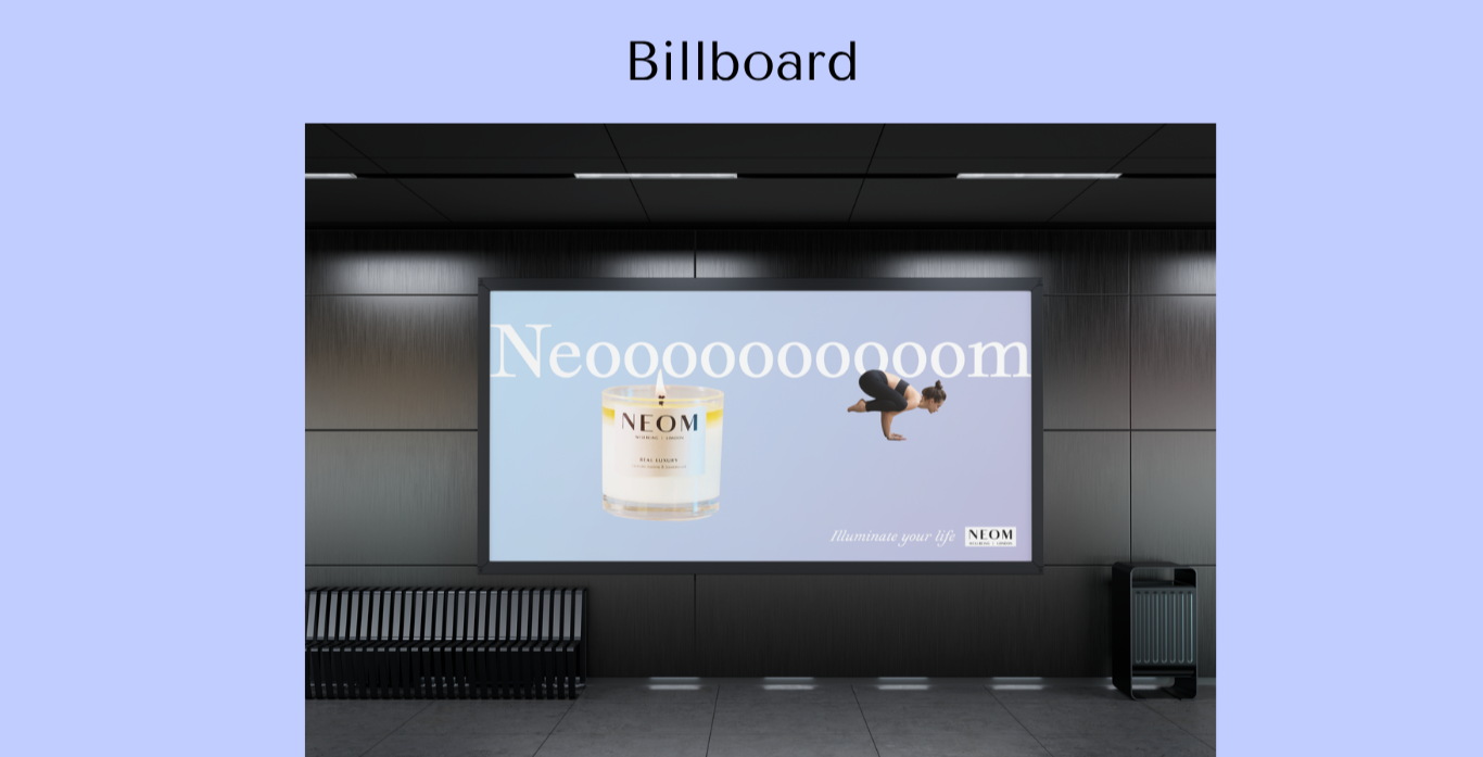 An indoor billboard advertisement featuring a large candle labeled NEOM and an image of a person doing a headstand, with the text "Neooooooooom" and "Illuminate your life" on a light blue background, in a modern interior space with benches and a tras