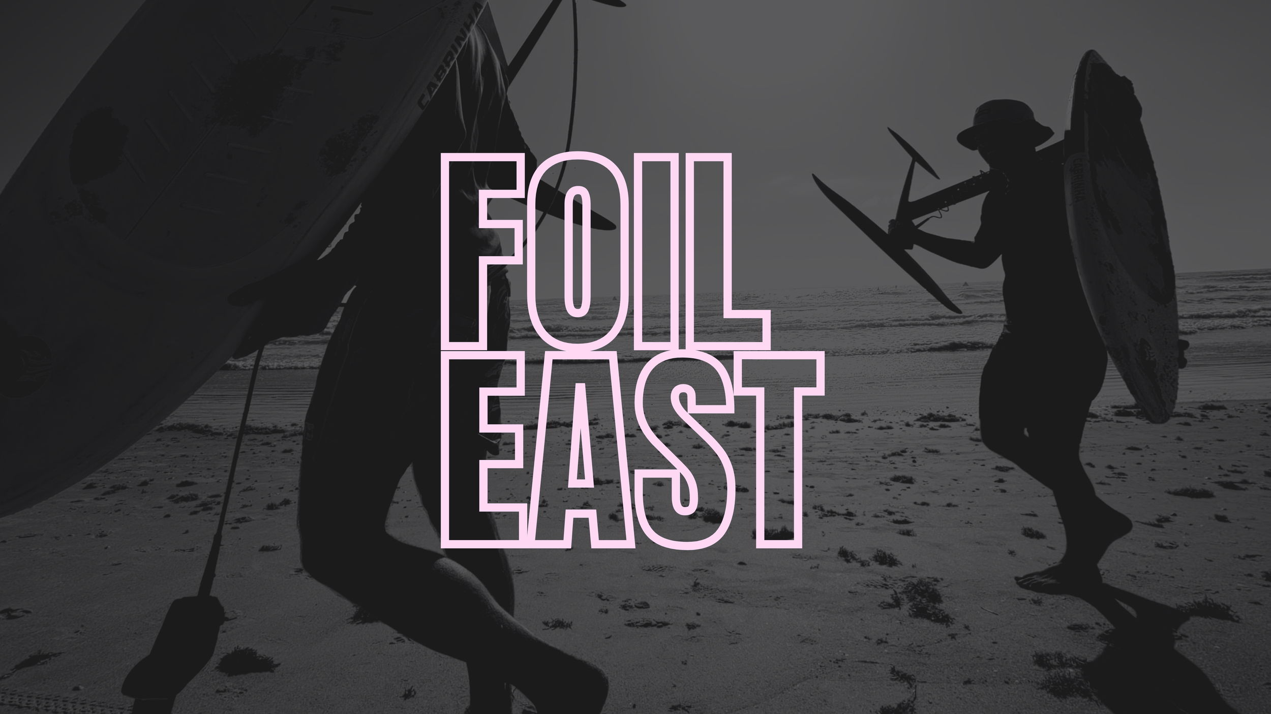 Silhouettes of two people on the beach carrying hydrofoils, with the text 'Foil Fast' in pink outlined letters overlaying the image.