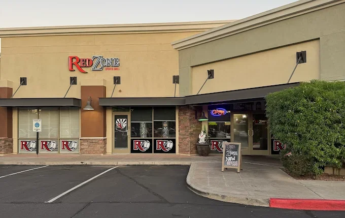 Red Zone Sports Grill, Front of Building, Hosts trivia, Live music, Off Track Betting, and Sporting Events