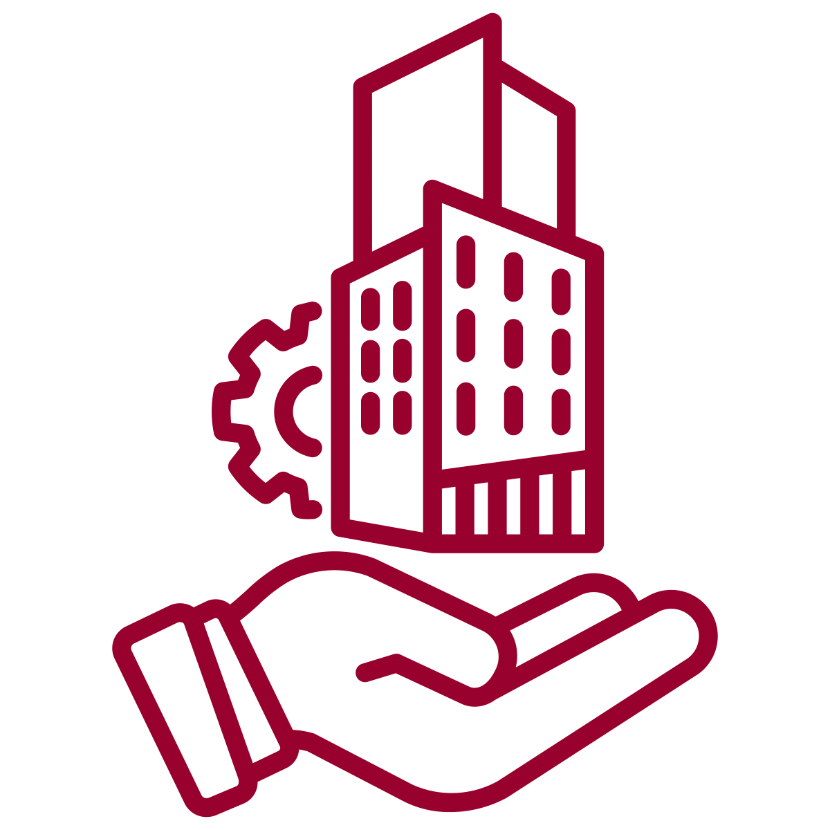 Outline of a hand holding a cityscape with buildings and a gear icon, representing urban planning or construction.