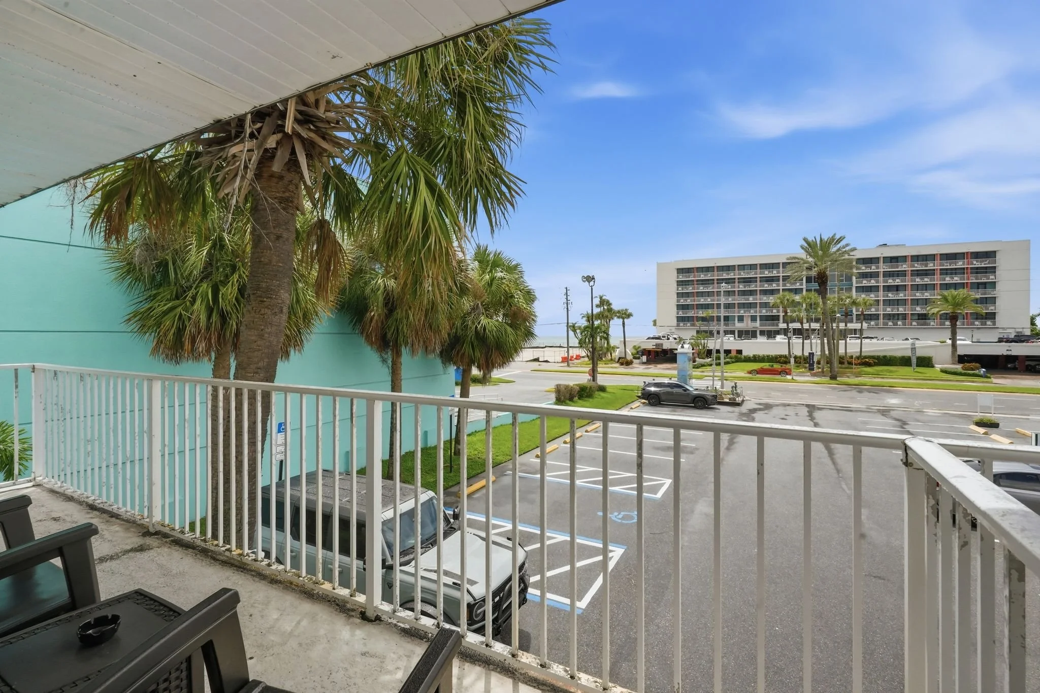 View of the Gulf and beach access across Gulf Blvd from a guest balcony, North Redington Beach